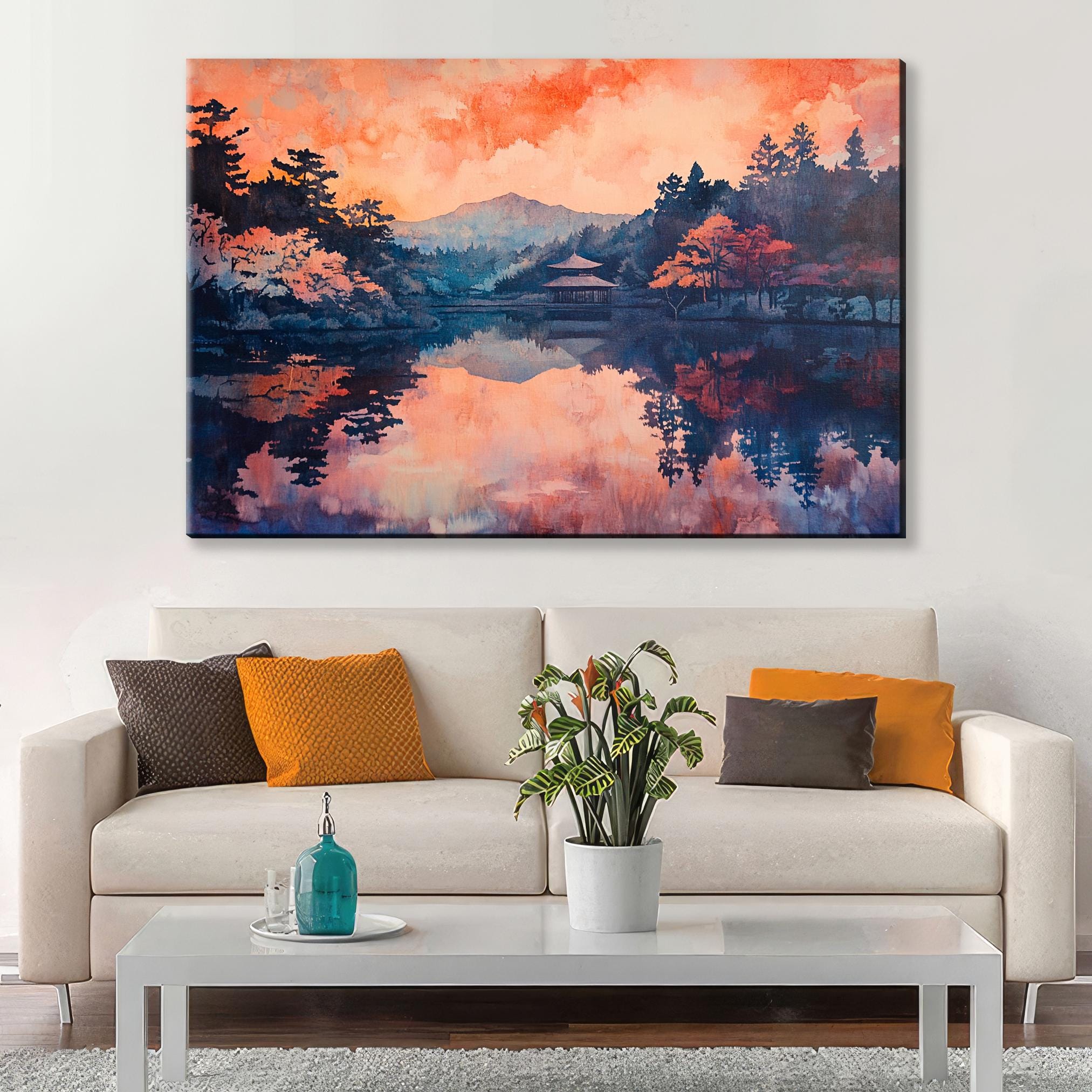 a living room with a couch and a painting on the wall