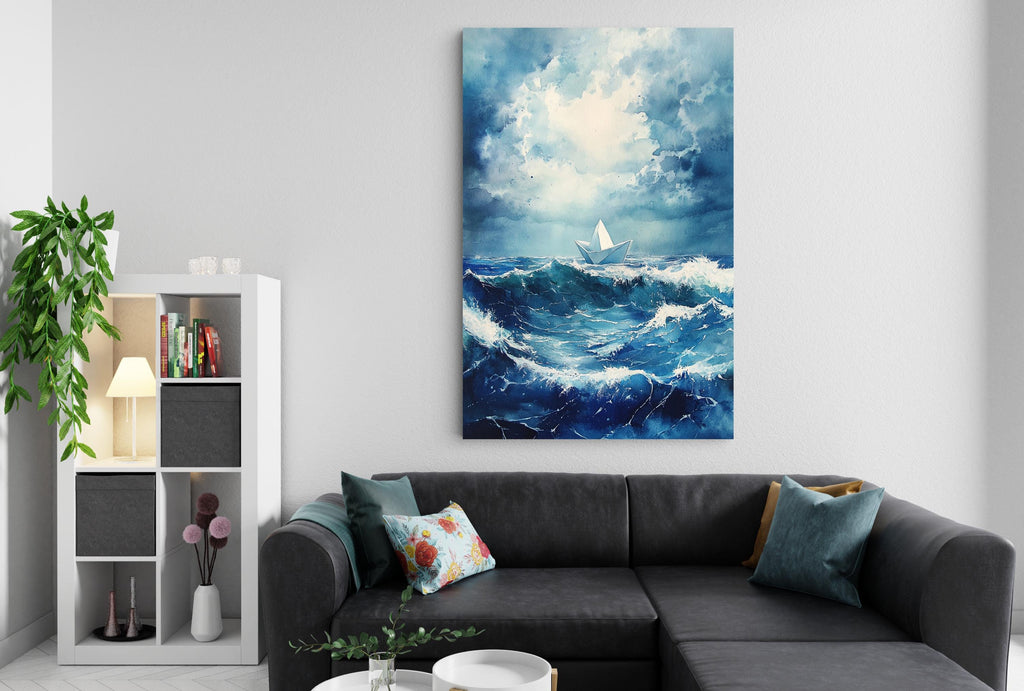 a living room with a gray sectional sofa, a bookshelf, and a large painting of a stormy ocean scene hanging on the wall.