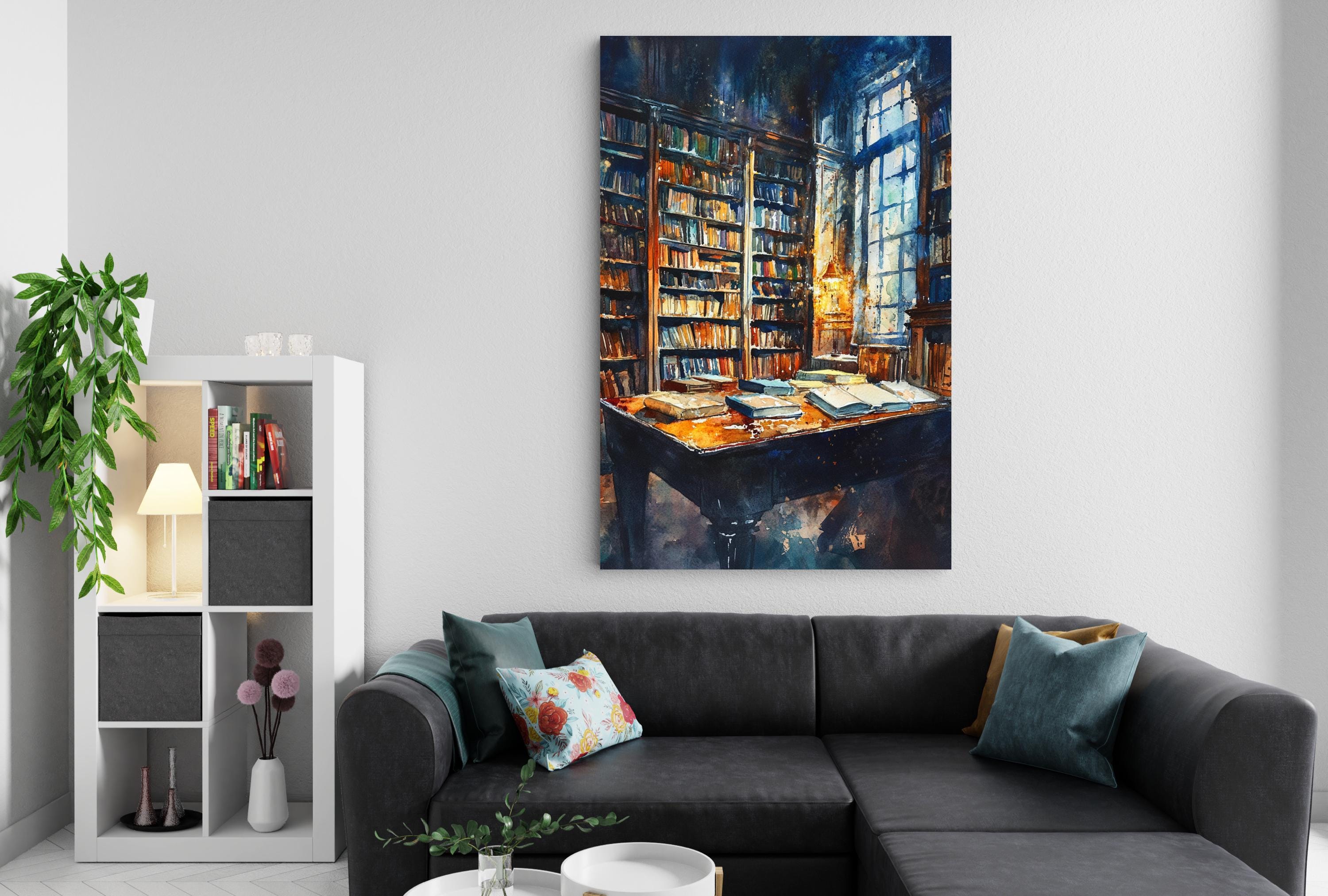a cozy living room with a large bookshelf filled with books, a comfortable black couch, and a coffee table with decorative items.