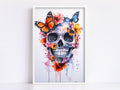 A framed artwork depicting a colorful and intricate skull design surrounded by butterflies and flowers.