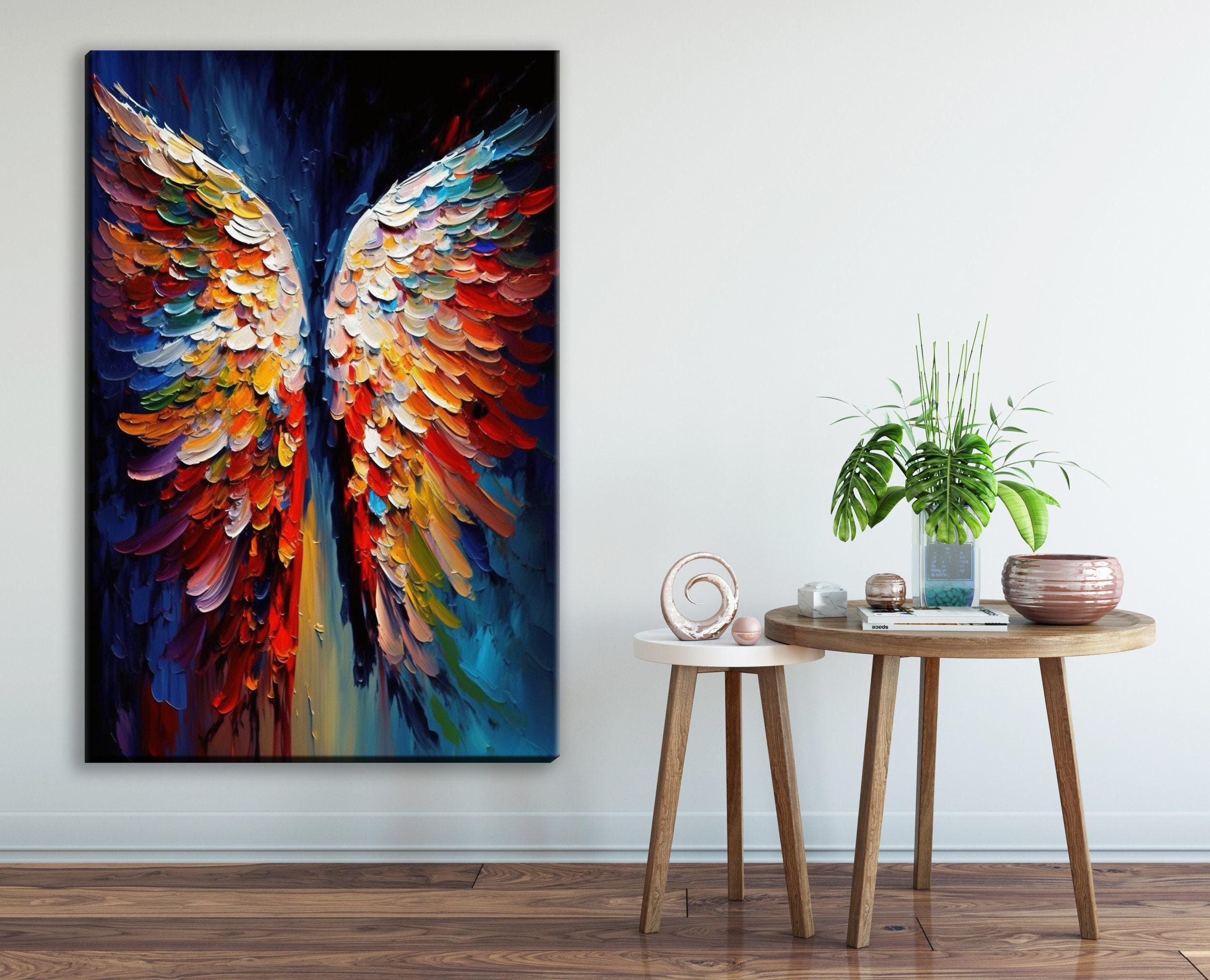 a large, colorful painting of a butterfly with vibrant, multicolored wings displayed on a wall next to a small round table with a plant and other decorative items.
