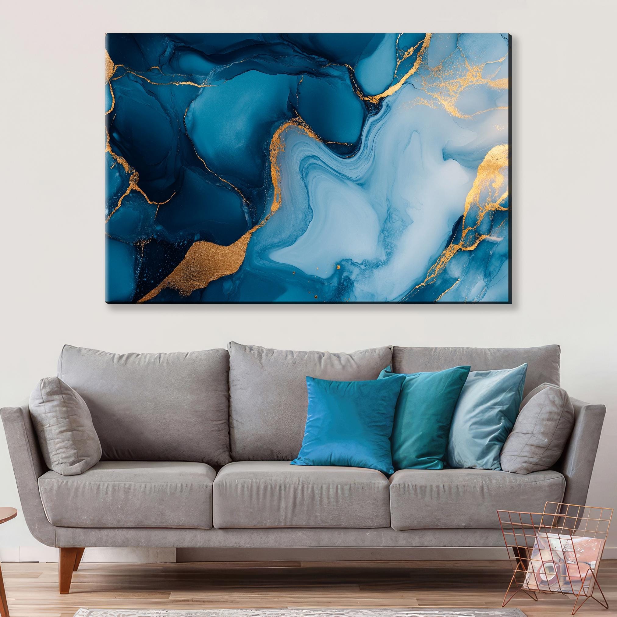 a living room with a couch and a painting on the wall