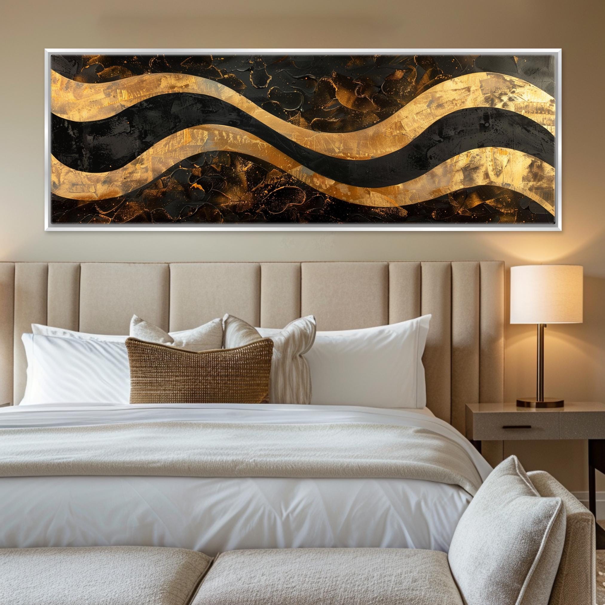 a bedroom with a large painting on the wall above the bed