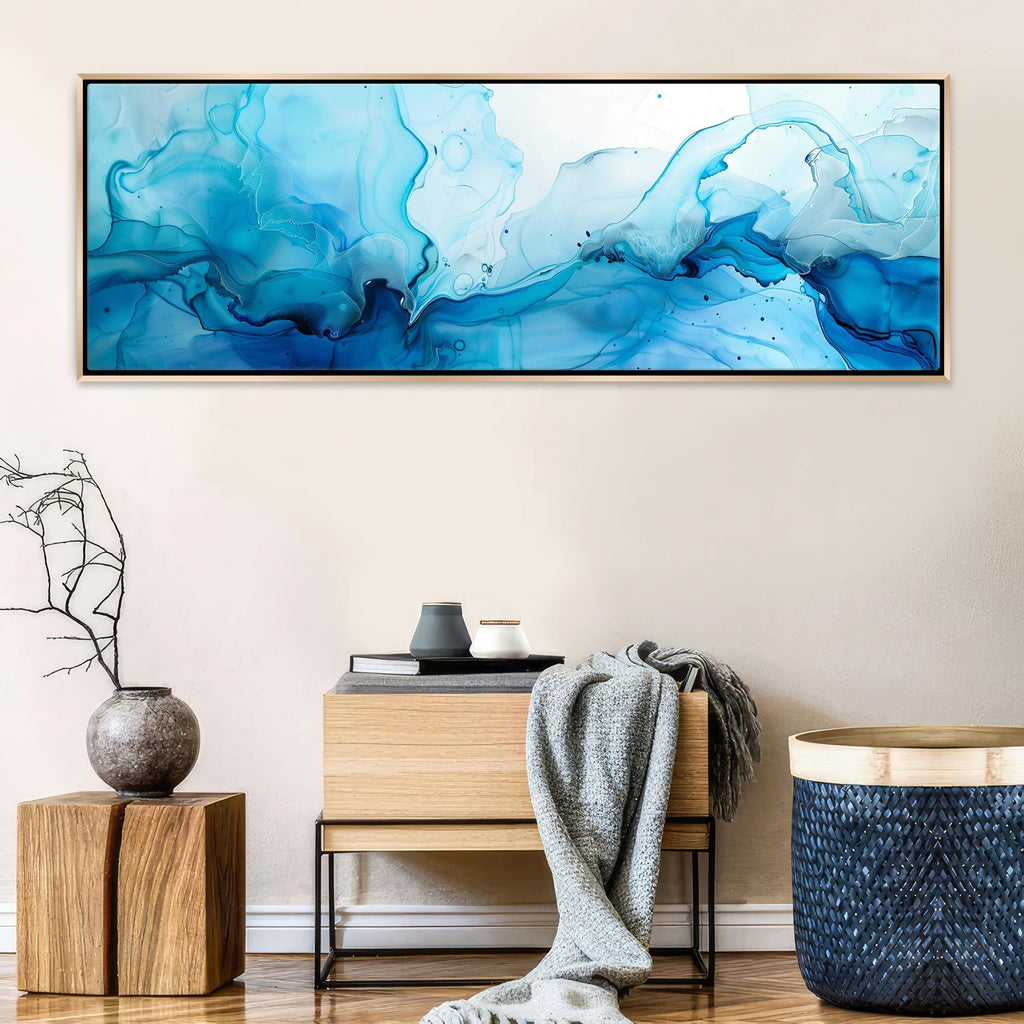 a painting hanging on a wall above a table