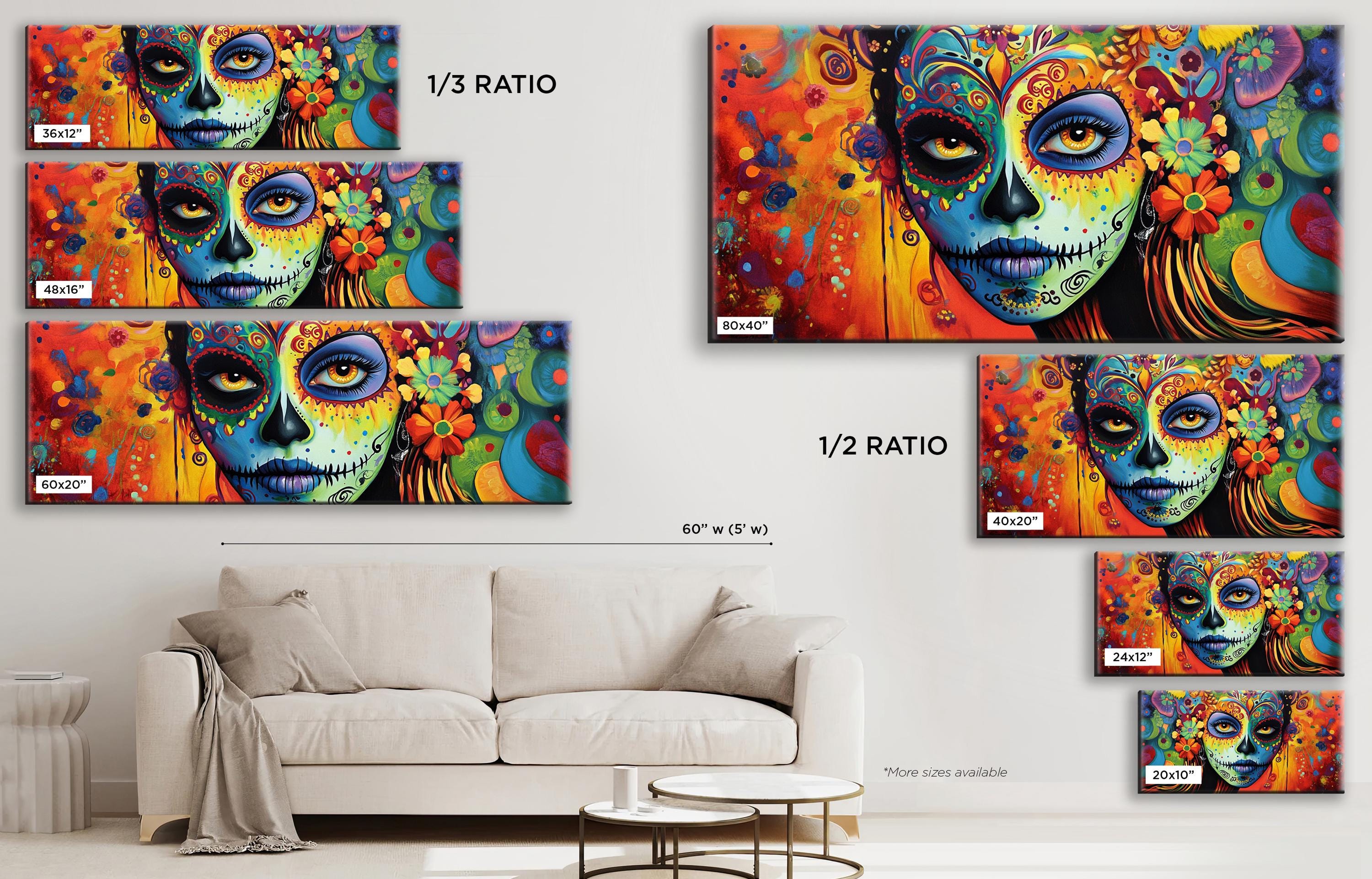 a living room with a white couch and paintings on the wall