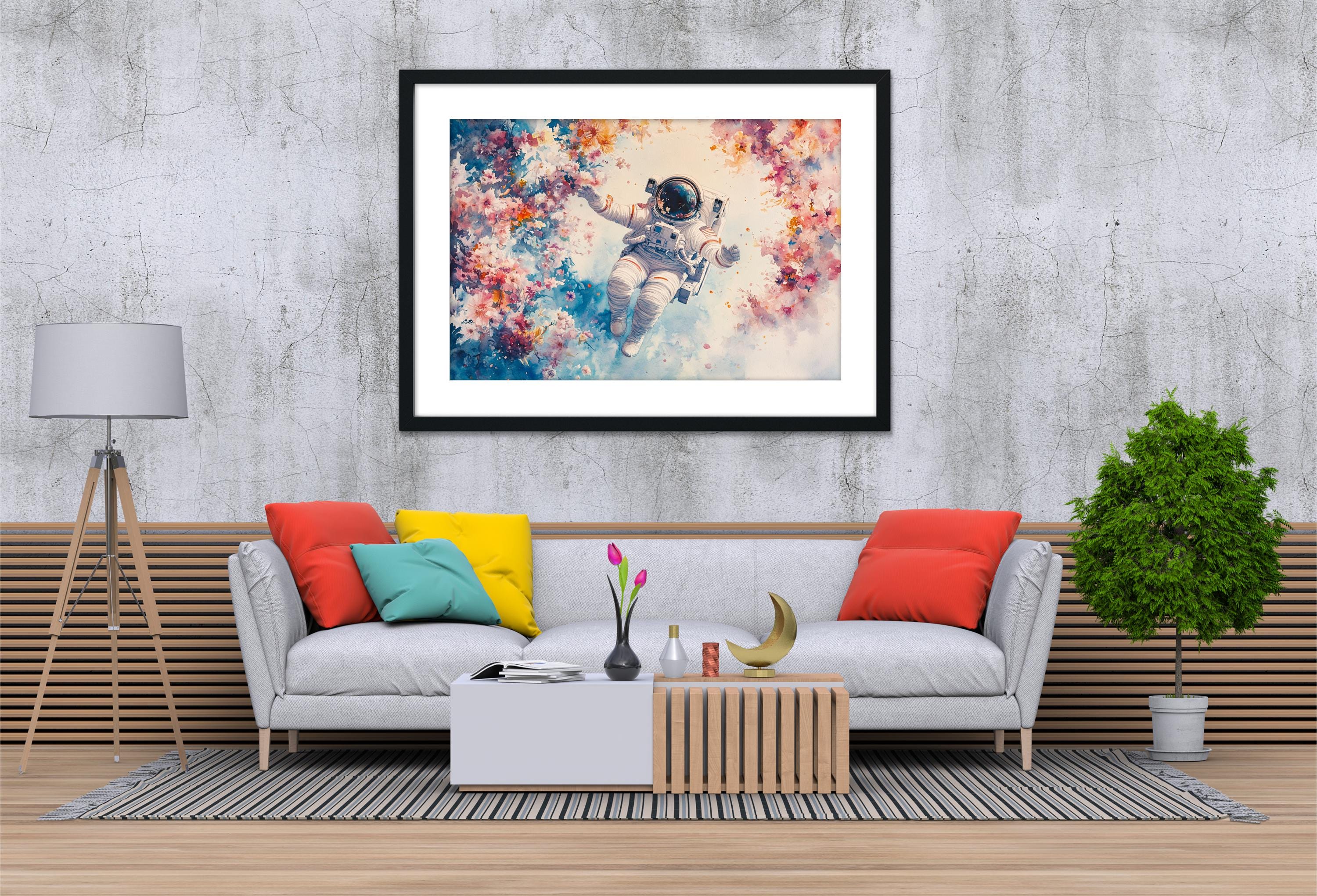 a cozy living room with a gray sofa adorned with colorful throw pillows, a wooden coffee table, and a framed picture of an astronaut floating in a colorful, floral-filled space.