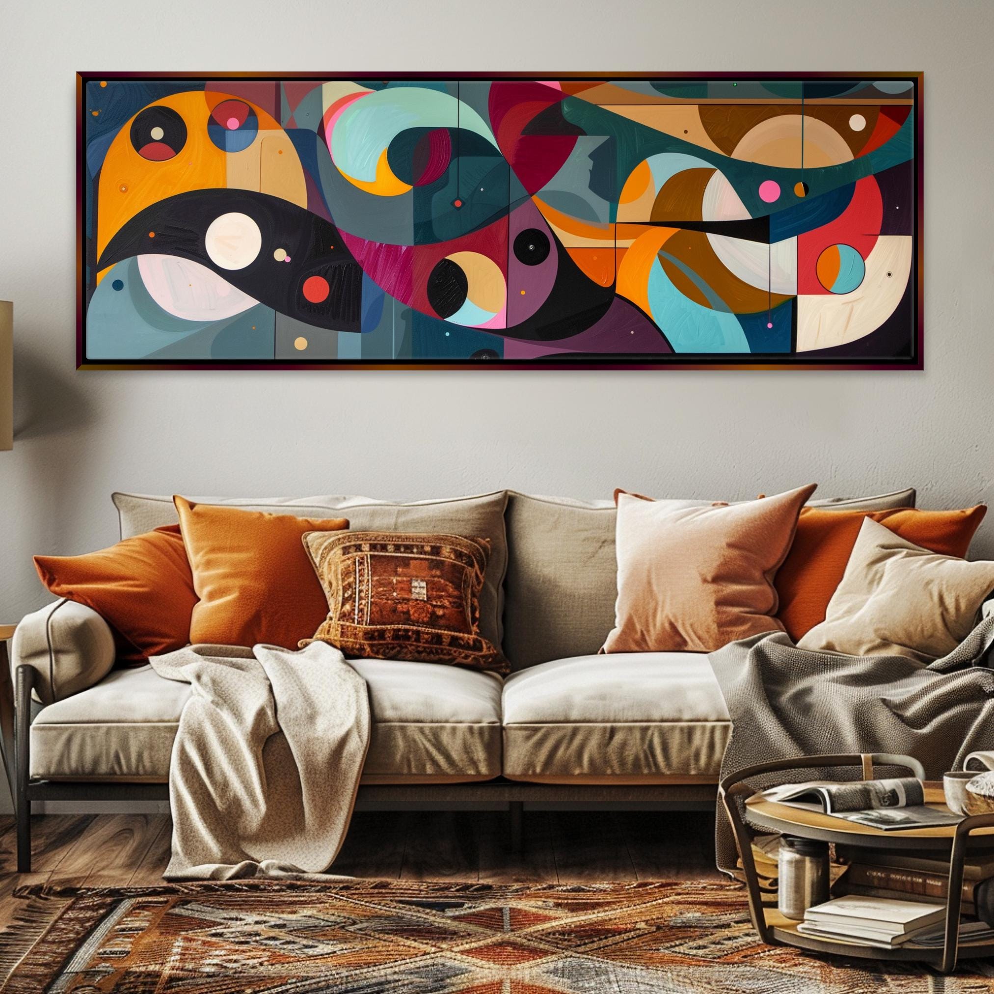 a living room with a couch and a painting on the wall