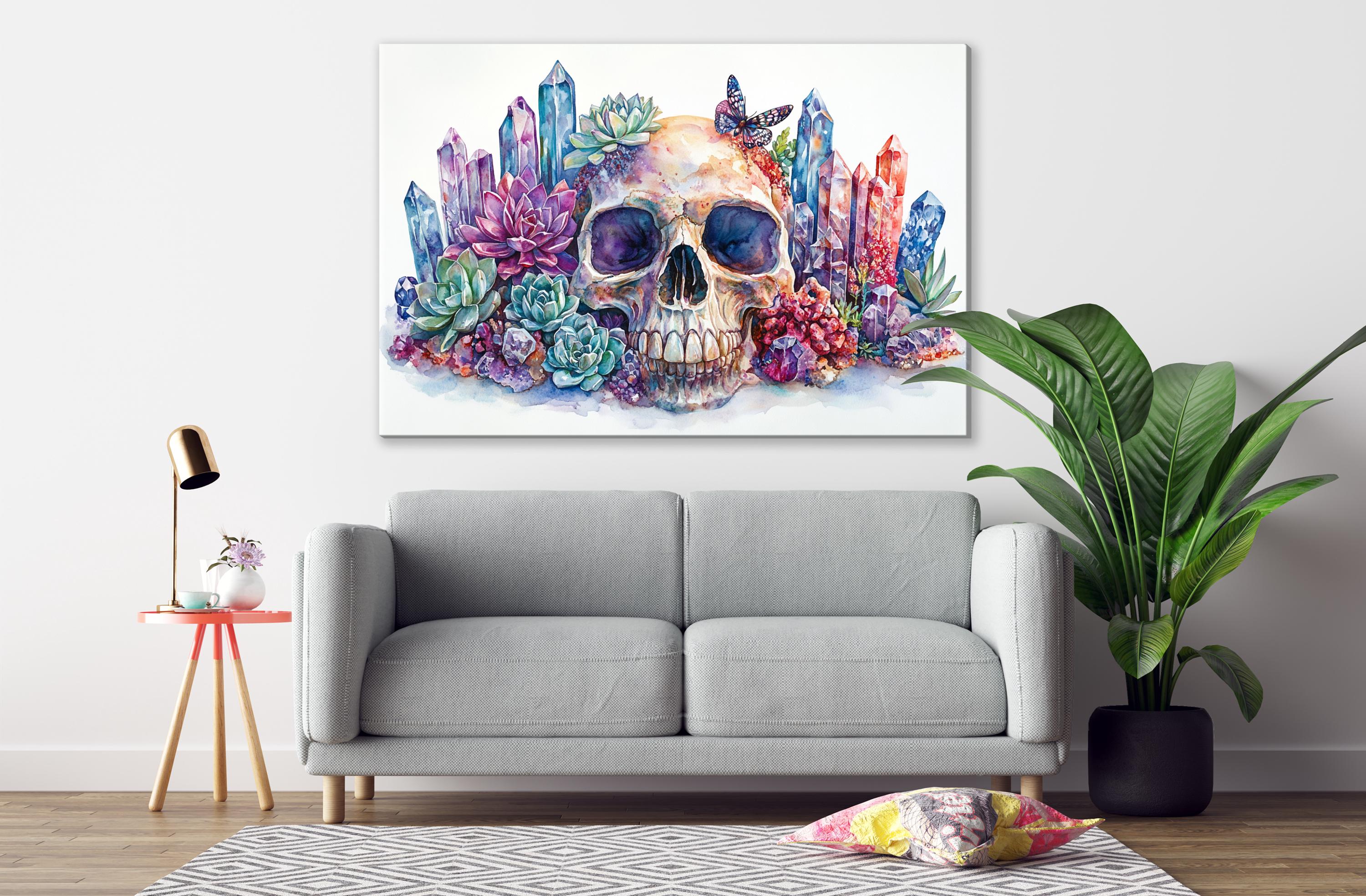 a gray sofa in a living room with a large painting of a skull surrounded by colorful crystals and plants hanging on the wall above it.