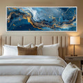 a bedroom with a large painting on the wall above the bed
