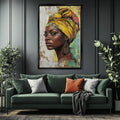 a living room with a green couch and a painting on the wall