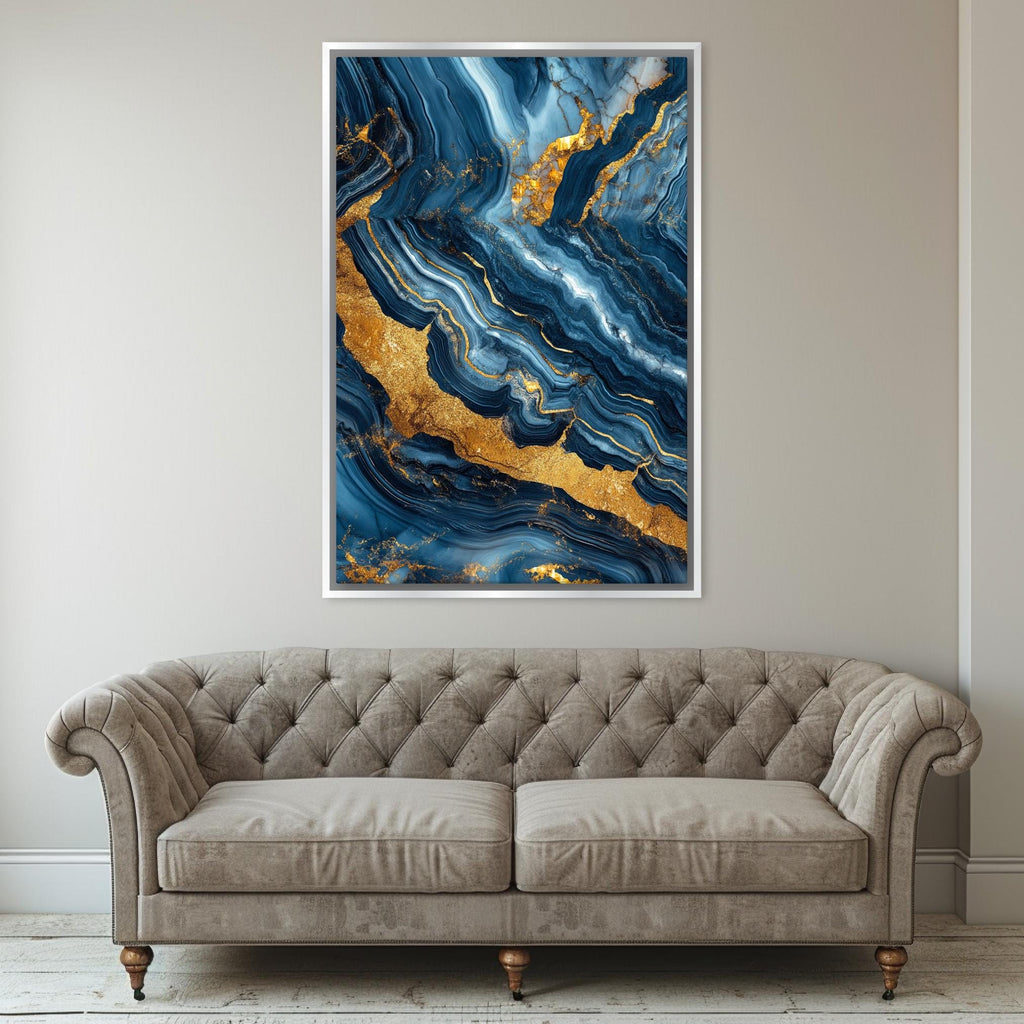 a living room with a couch and a painting on the wall
