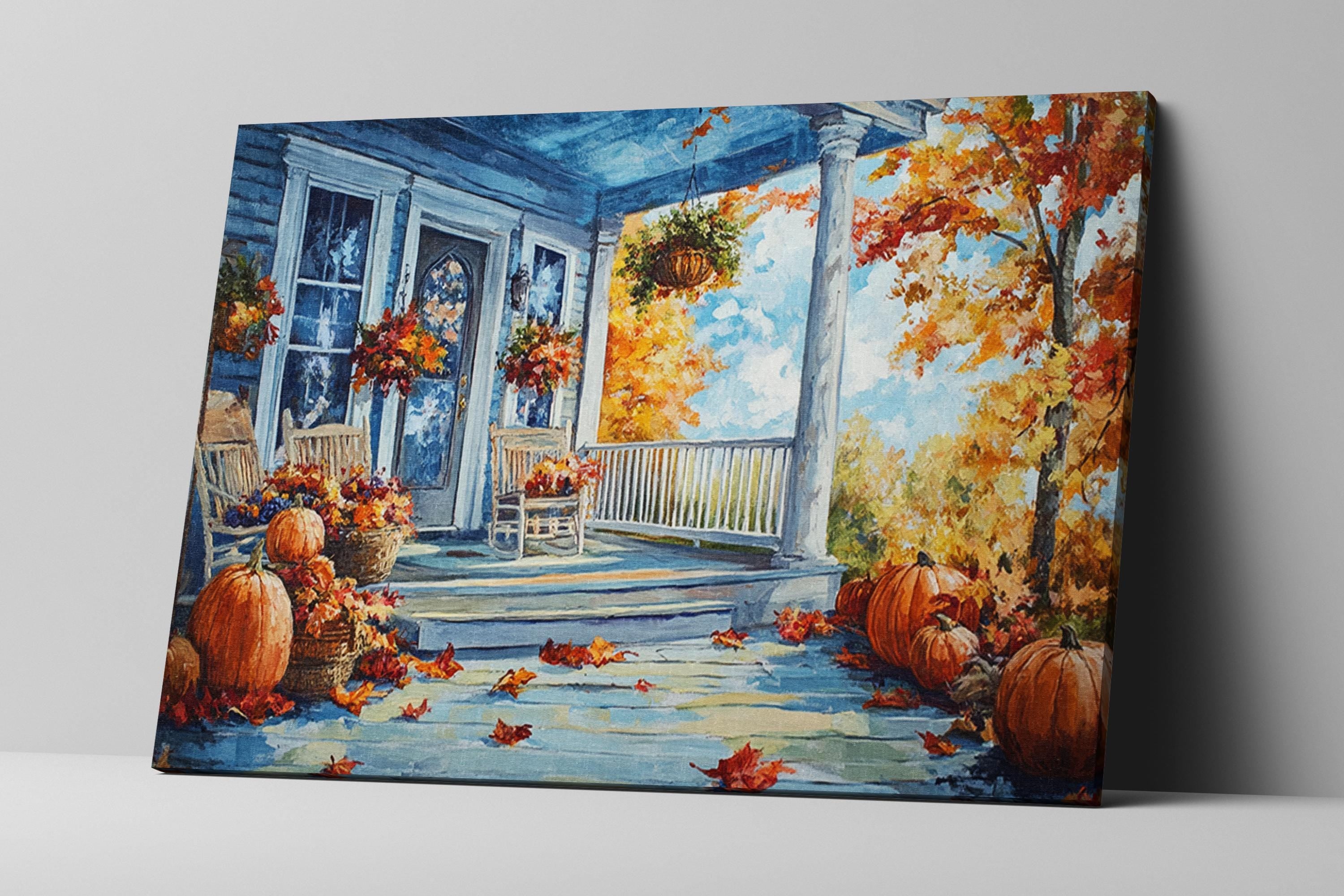 a cozy autumn scene on a porch, with a blue house, white railing, and a white porch. The porch is decorated with pumpkins and leaves, creating a festive atmosphere.