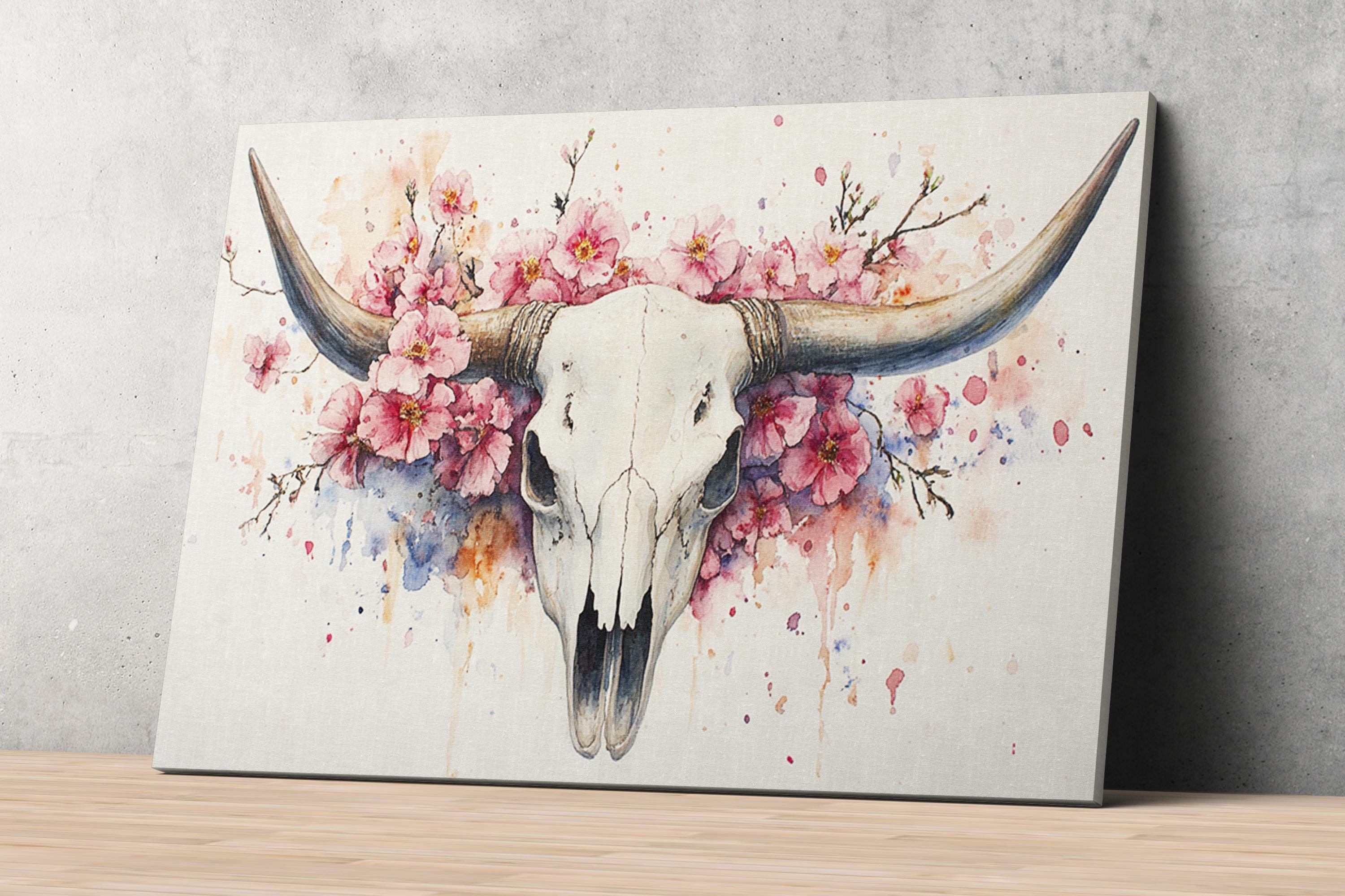 A painting of a white skull with large horns, surrounded by pink flowers and branches.