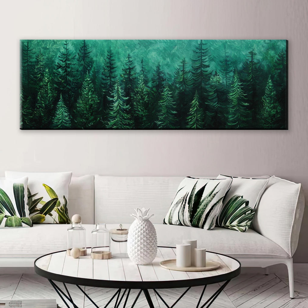 a living room with a white couch and a painting on the wall