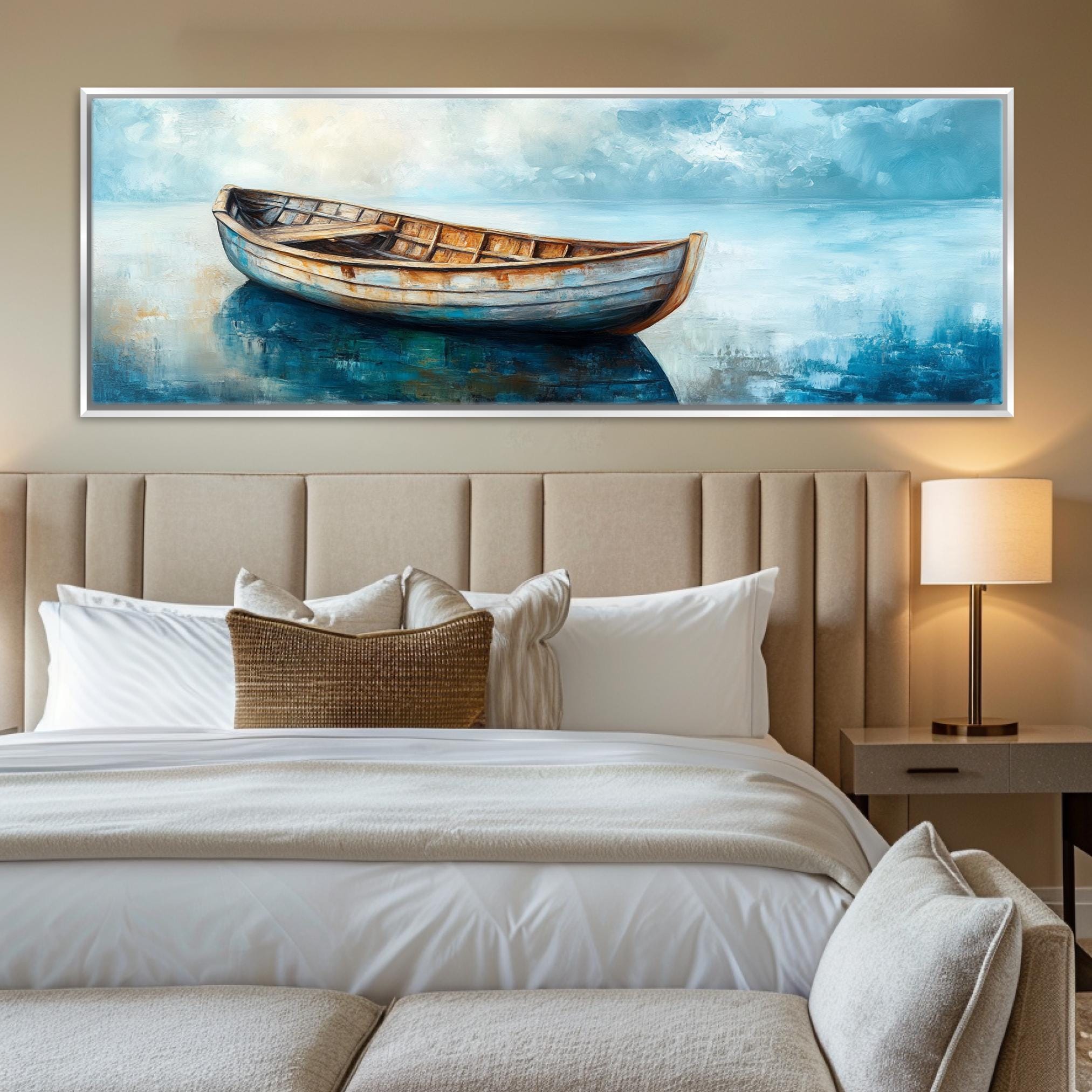 a painting of a boat on a wall above a bed