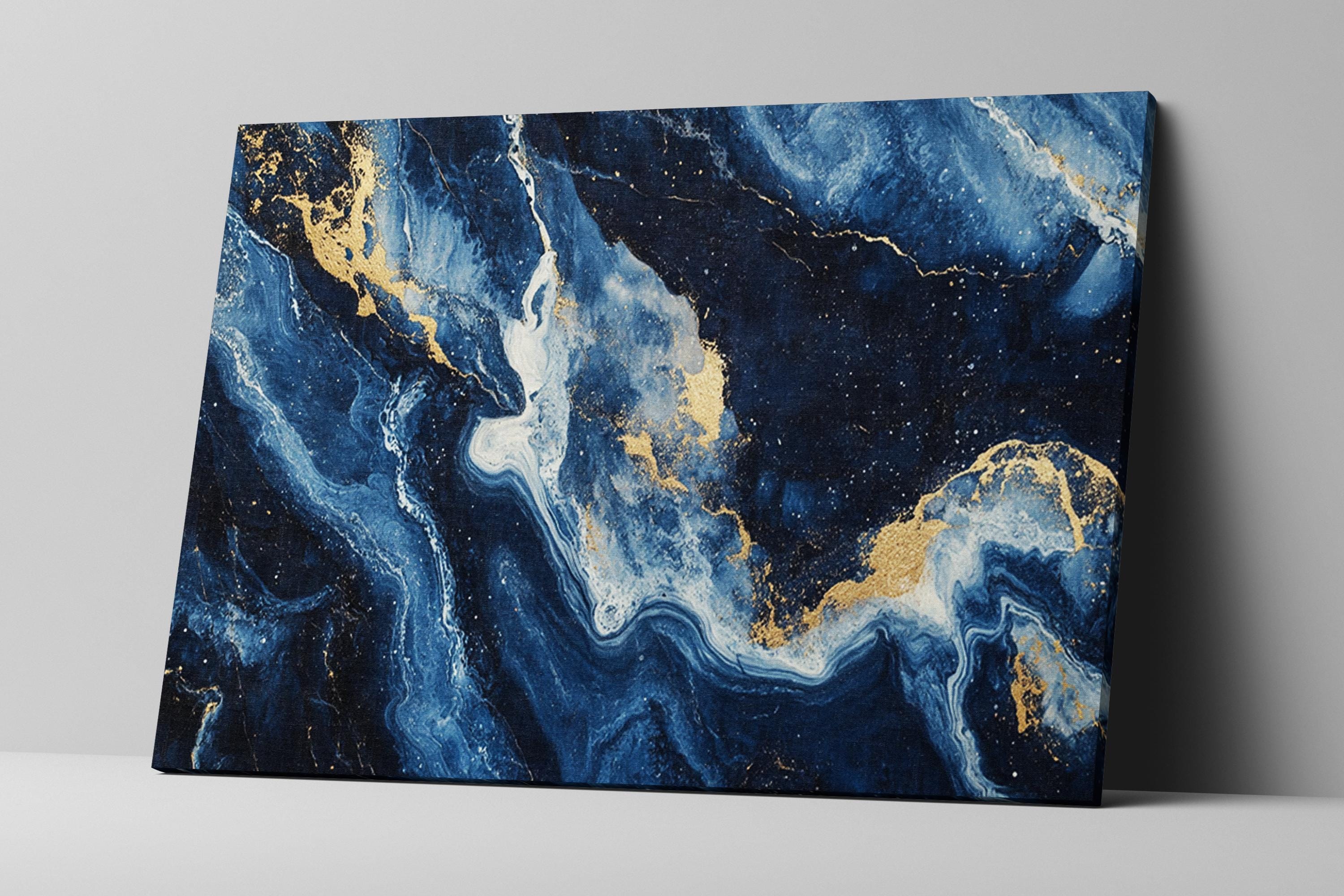 a blue and gold painting on a white wall