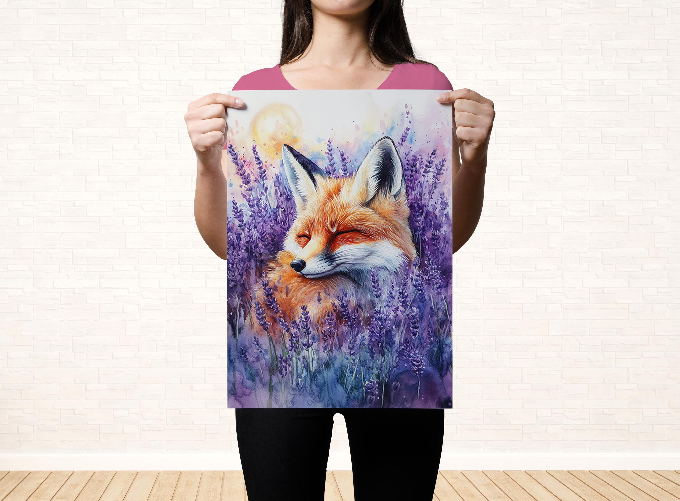 A woman holds up a framed painting of a fox surrounded by purple flowers.