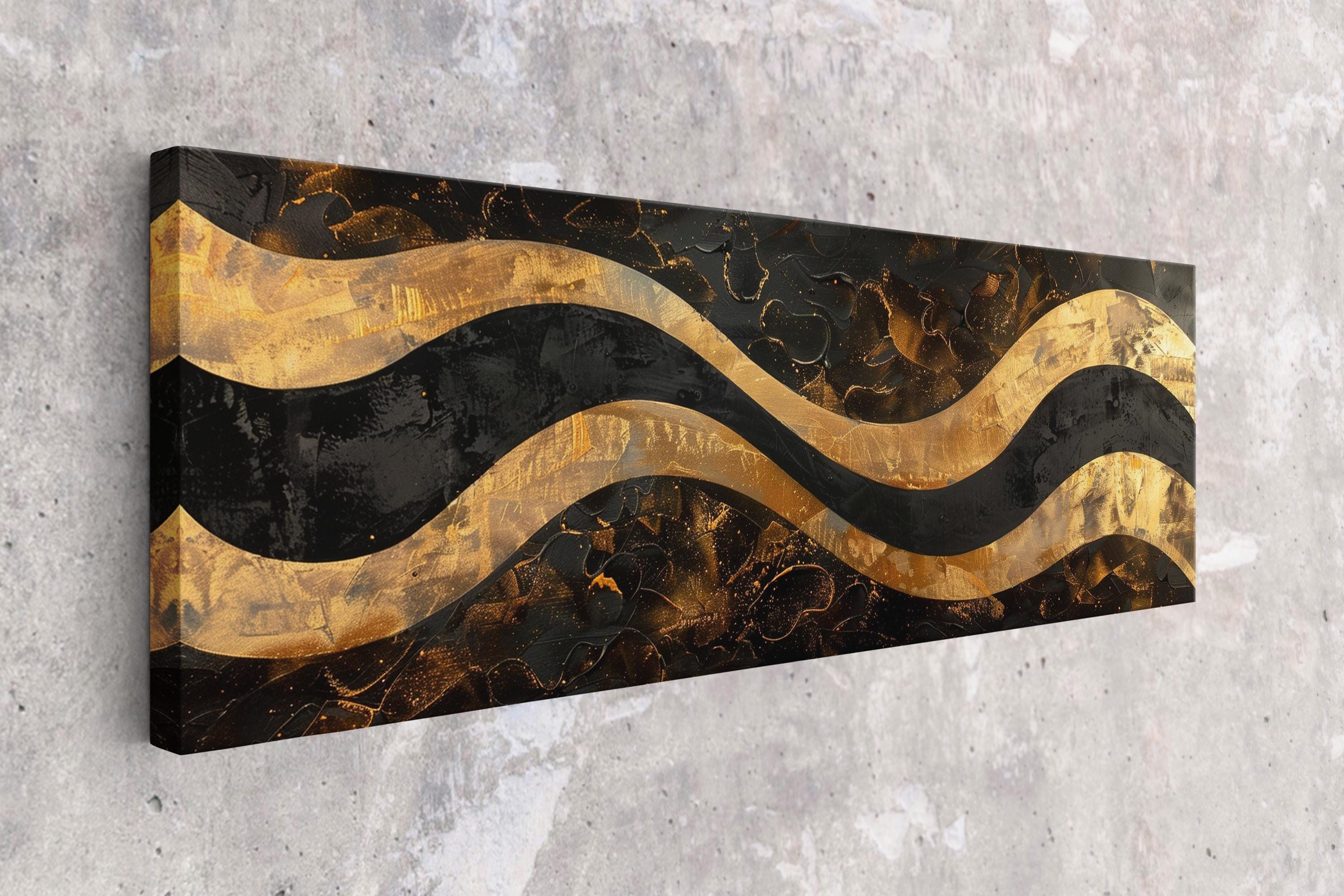 a black and gold abstract painting on a wall