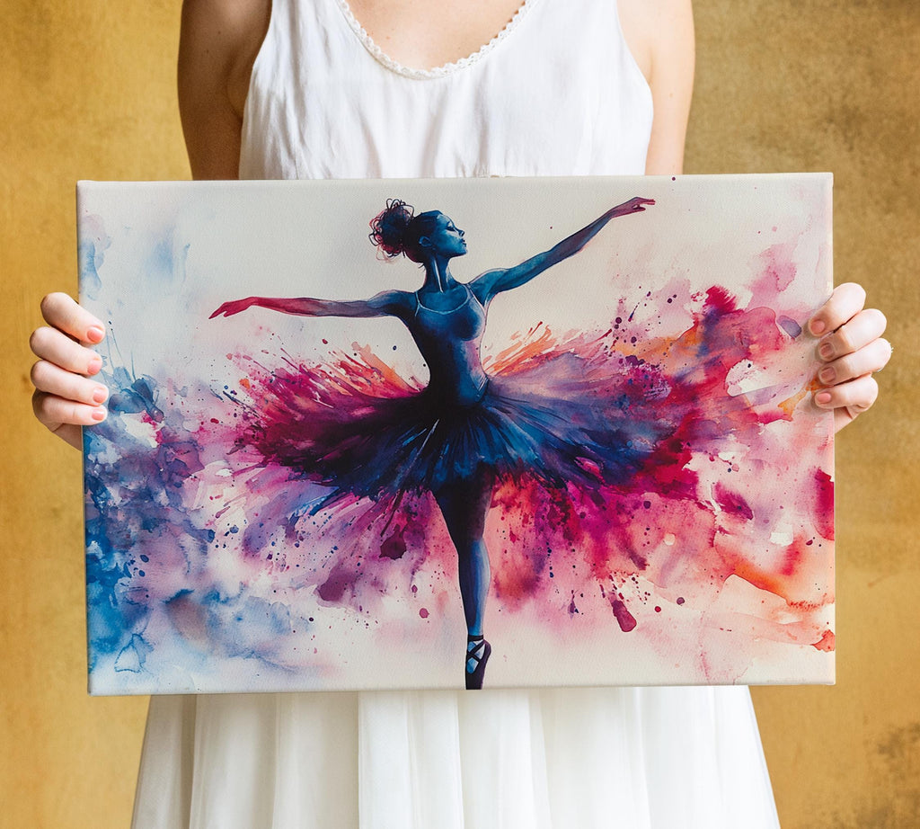 A woman is holding a large canvas print featuring a painting of a ballerina in a tutu, with vibrant colors and dynamic brushstrokes.