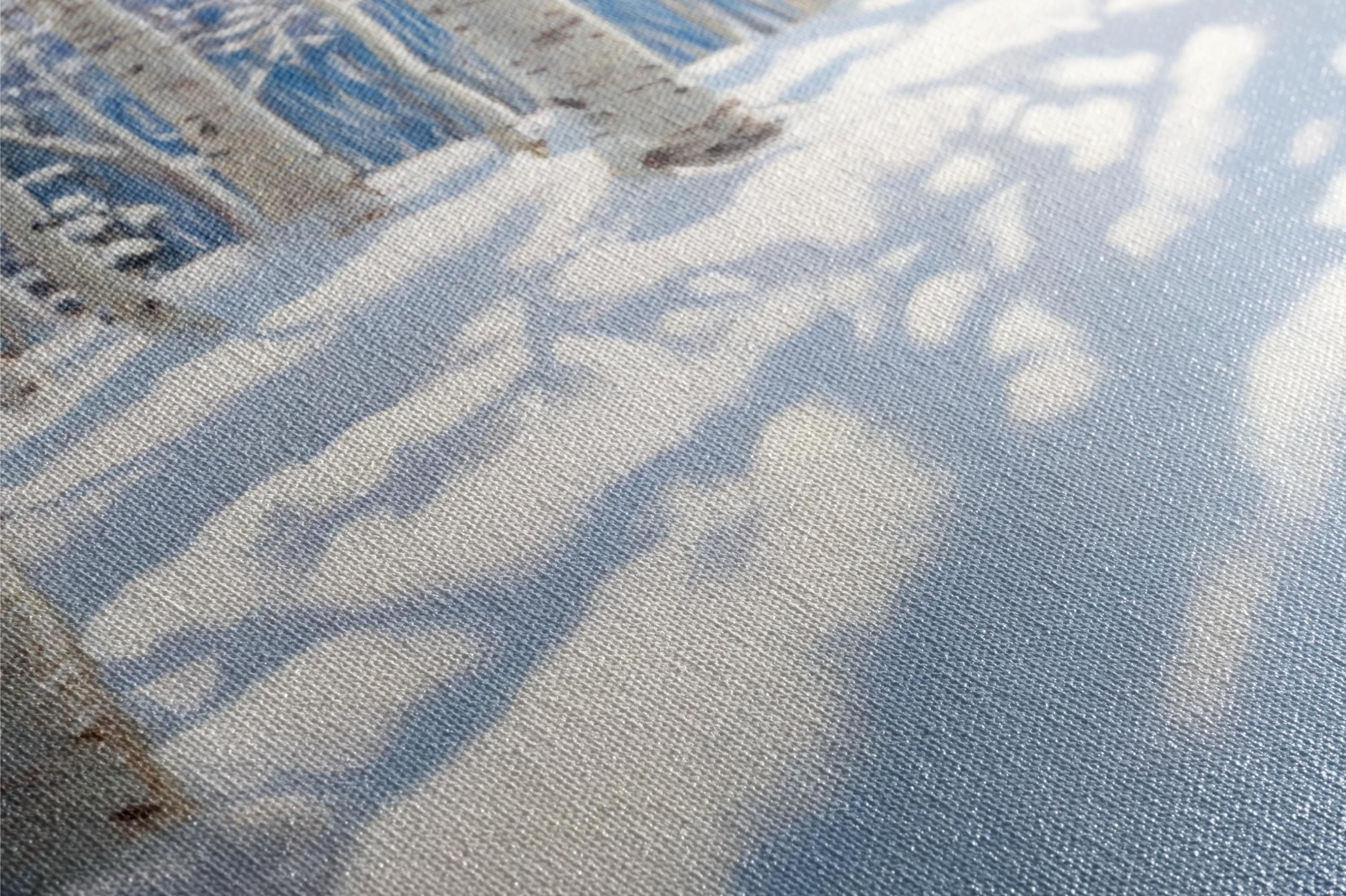 a close up of a snow covered ground with trees in the background