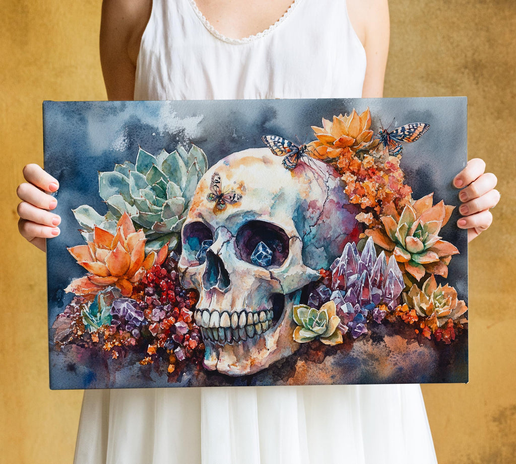 A person is holding a framed painting of a skull surrounded by colorful flowers and butterflies.