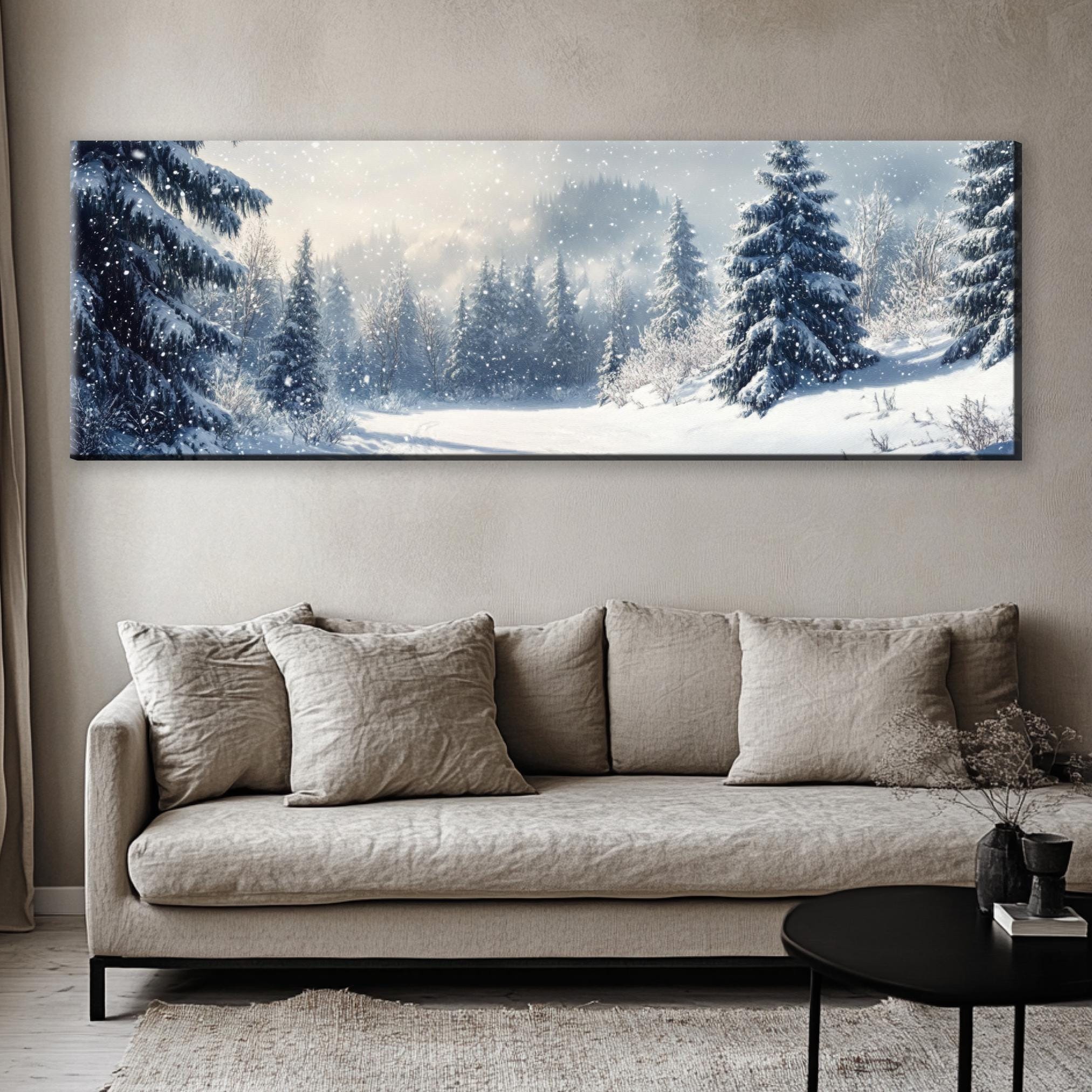 a living room with a couch and a painting on the wall