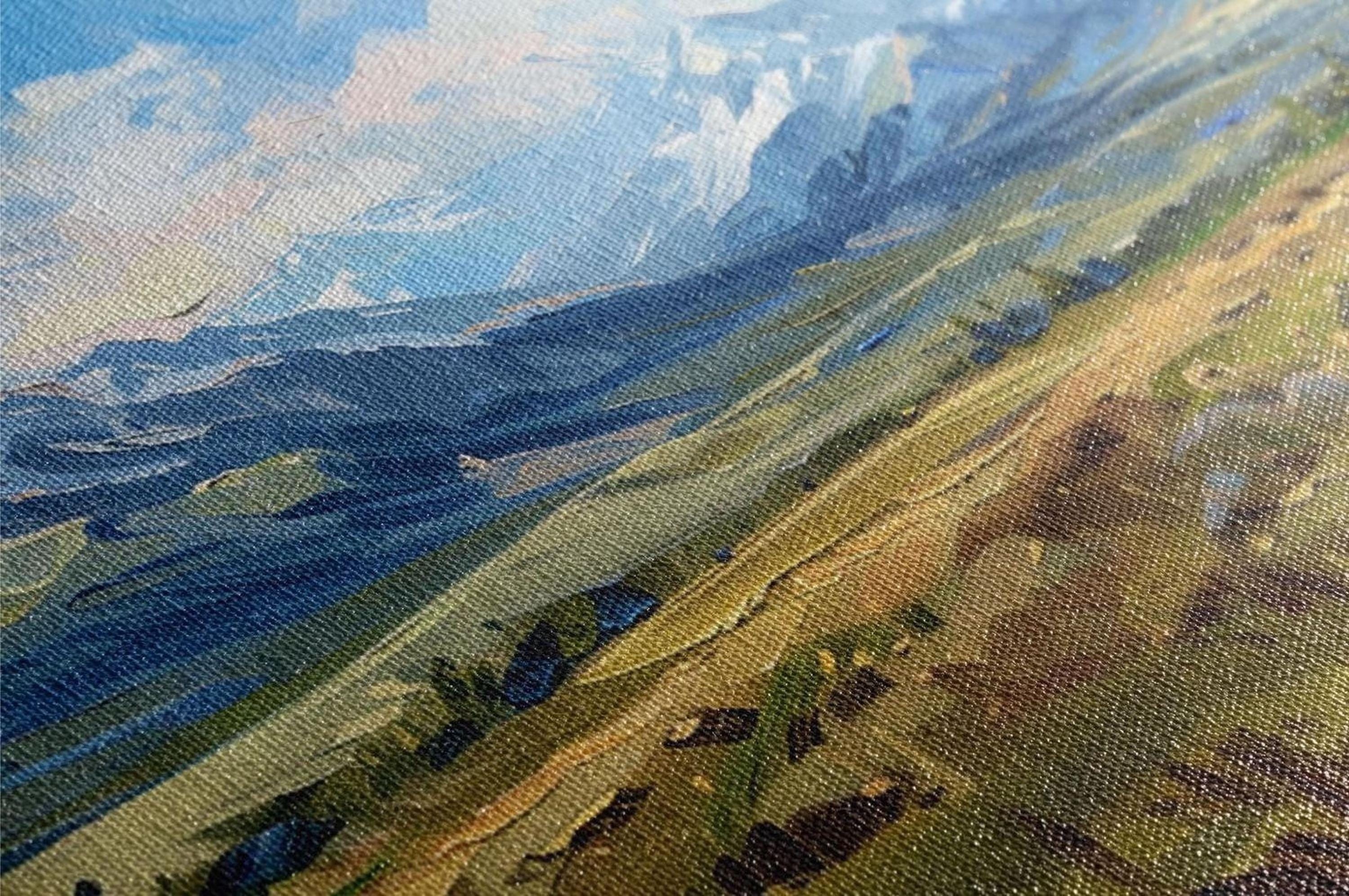 The image is a close-up of a painting depicting a landscape with mountains and a winding road.