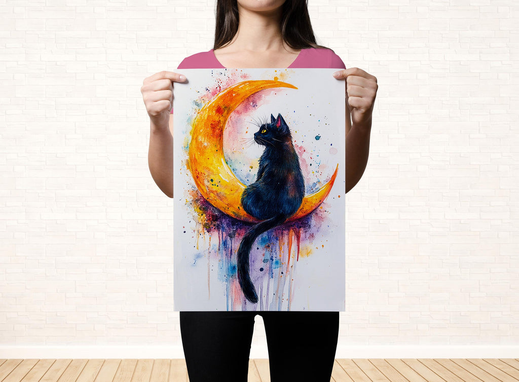 A woman holds up a colorful painting of a black cat sitting on a crescent moon.