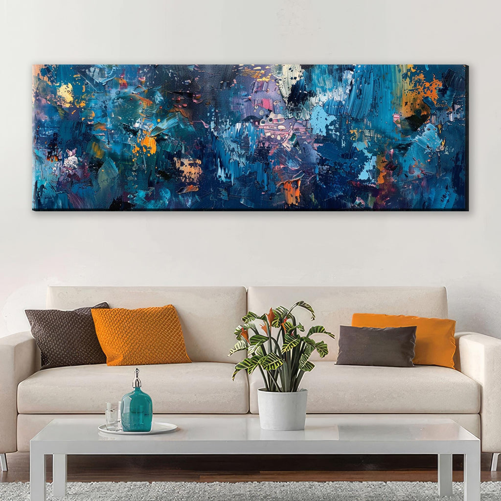 a living room with a couch and a painting on the wall