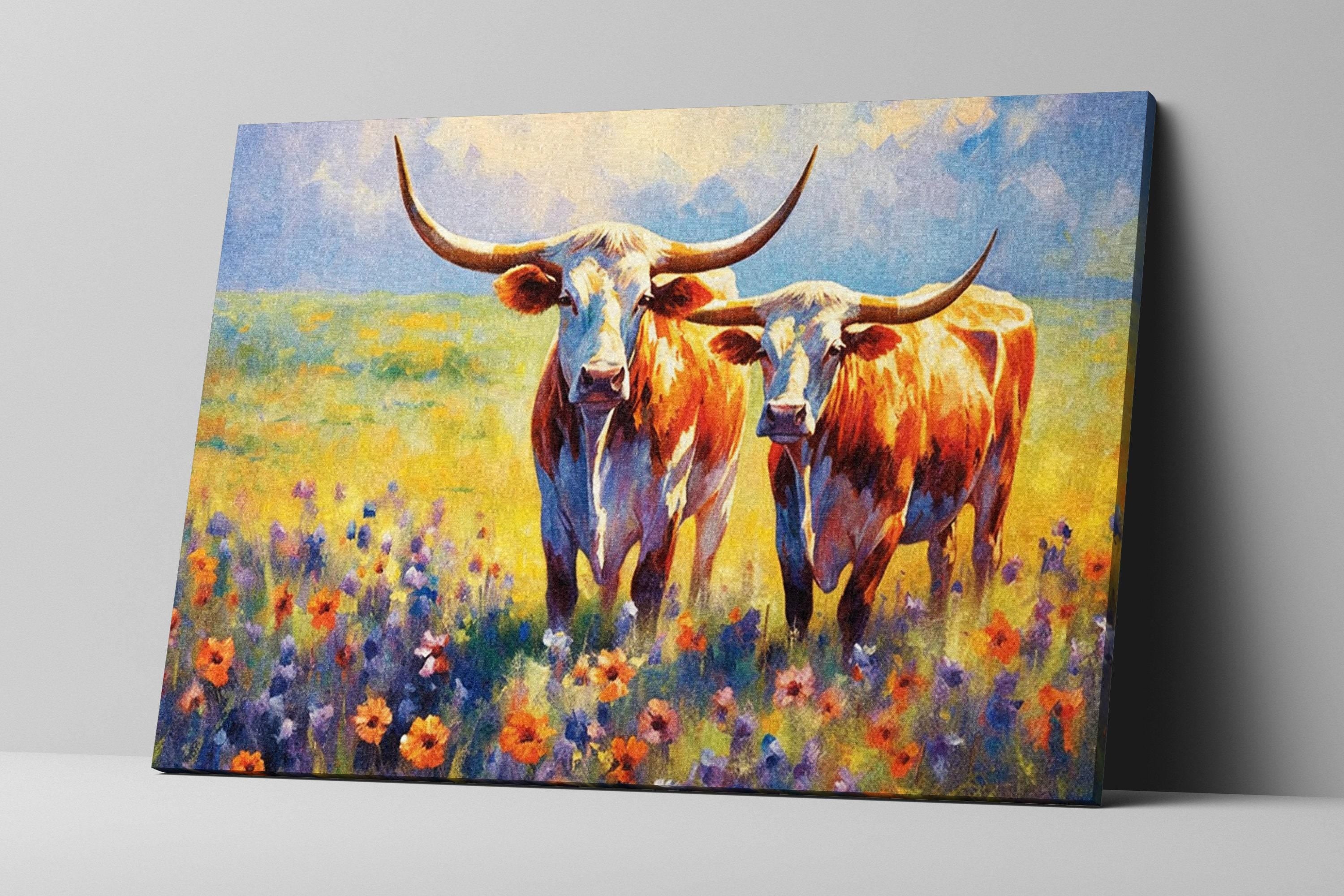 two cows standing in a field of flowers, with a blue sky and clouds in the background.