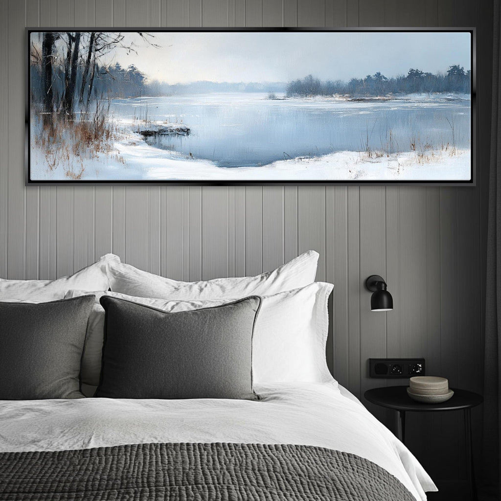 a bedroom with a bed and a painting on the wall