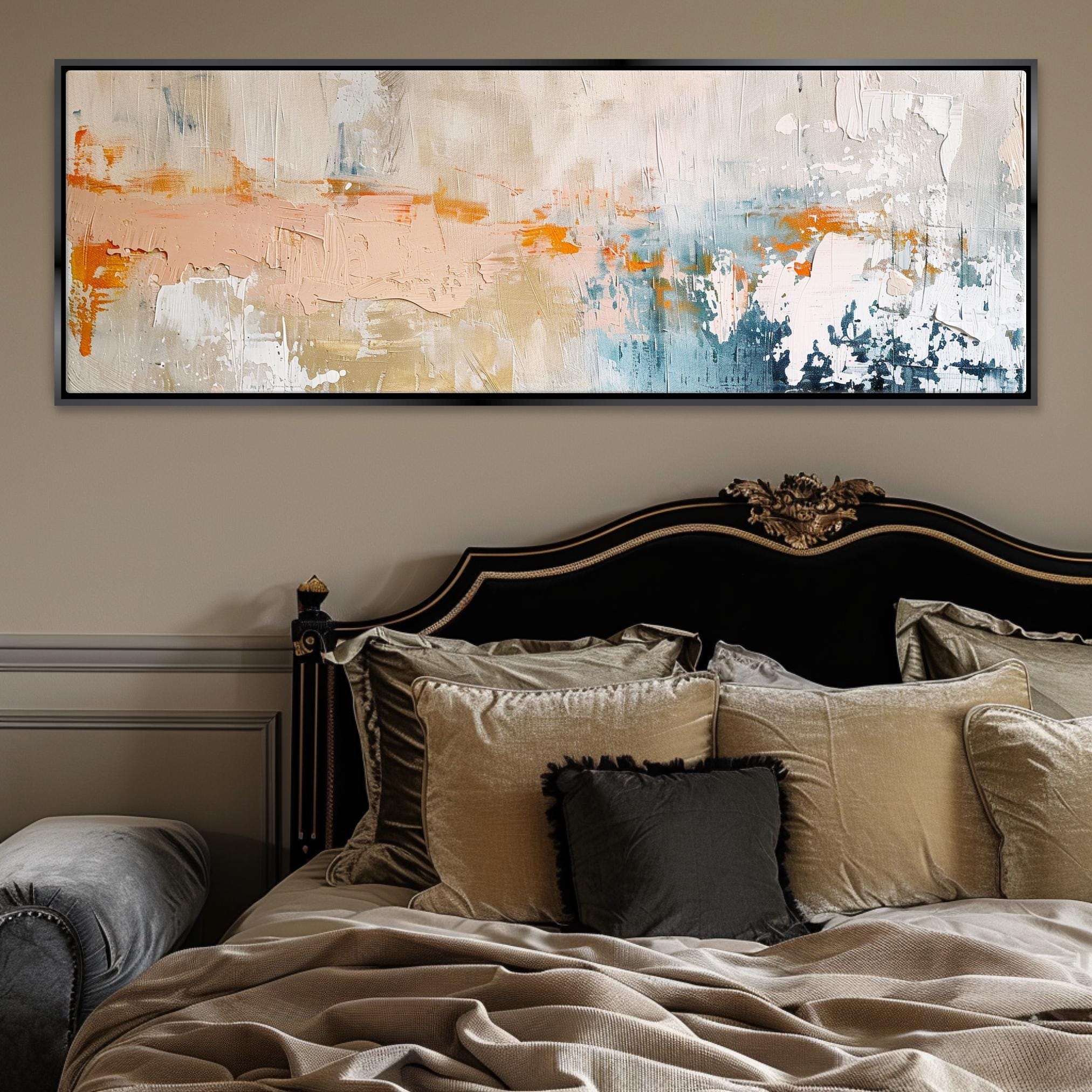 a bed with a large painting above it