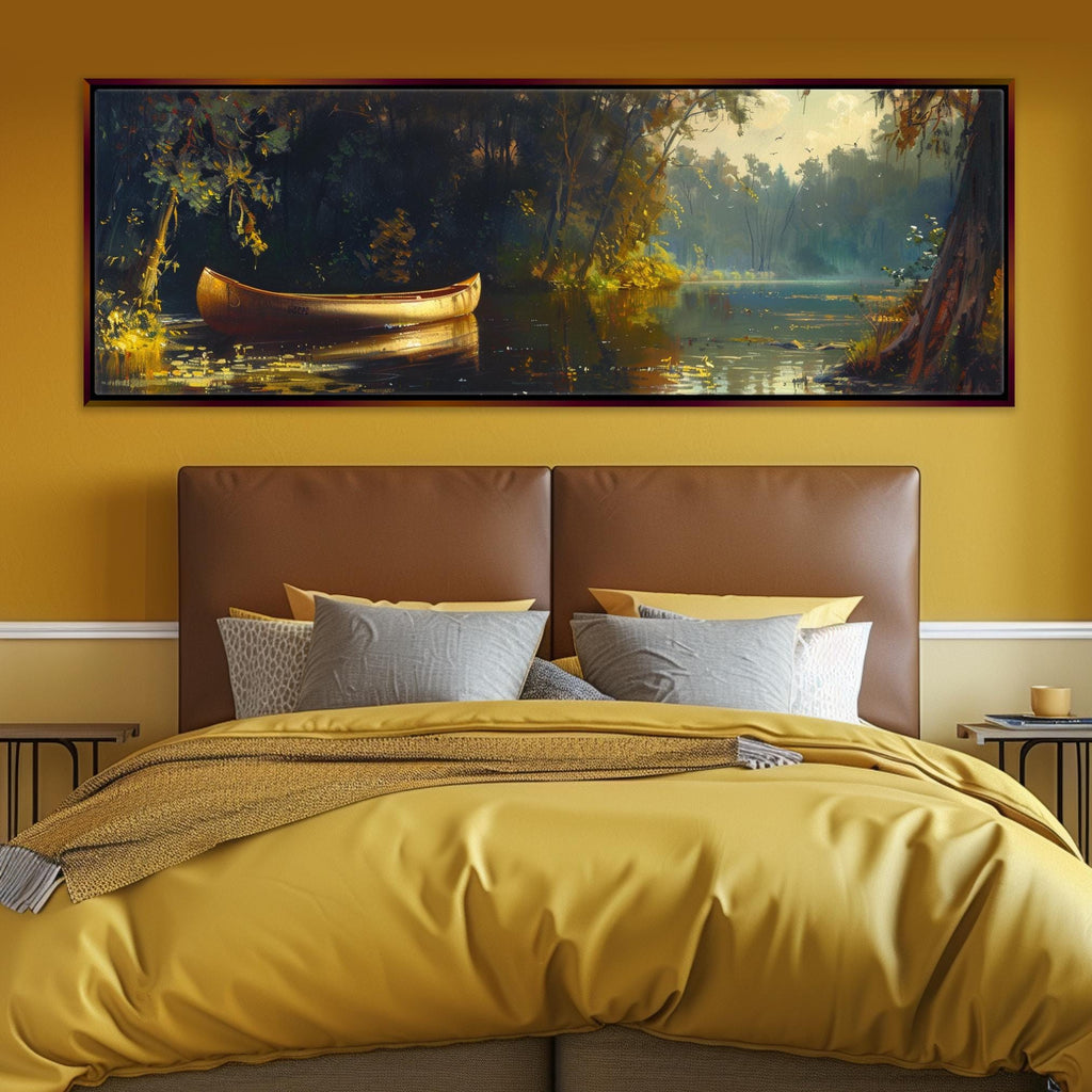 a bed with a yellow comforter and a painting on the wall