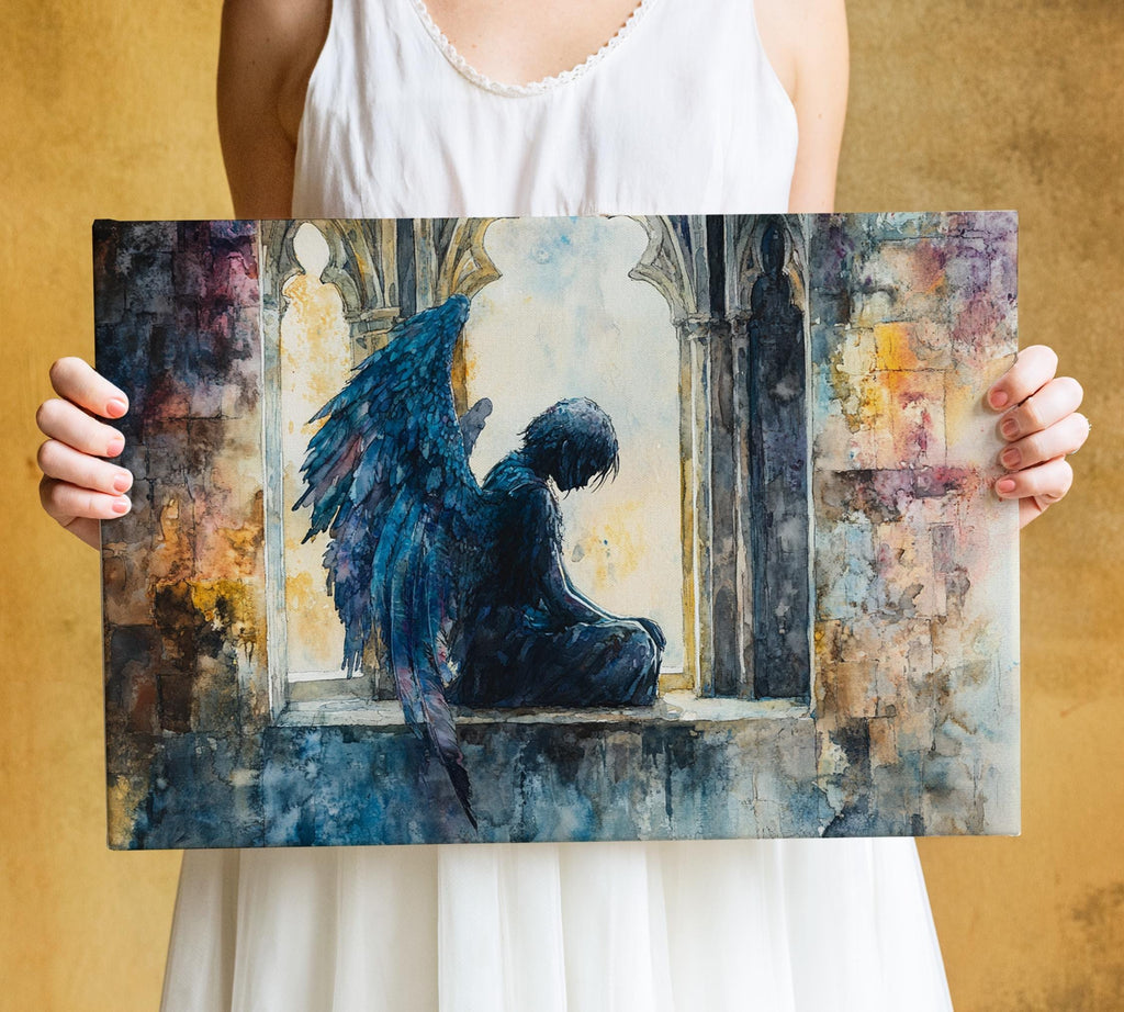 A person is holding a framed painting of a winged figure sitting in a window frame.