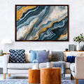 a living room filled with furniture and a painting on the wall