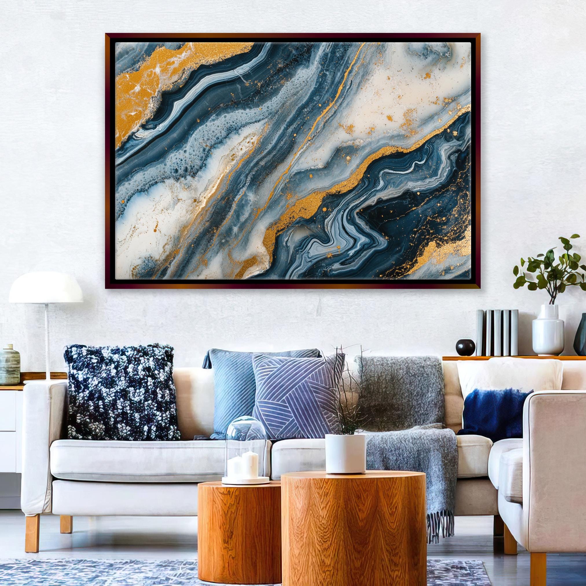 a living room filled with furniture and a painting on the wall
