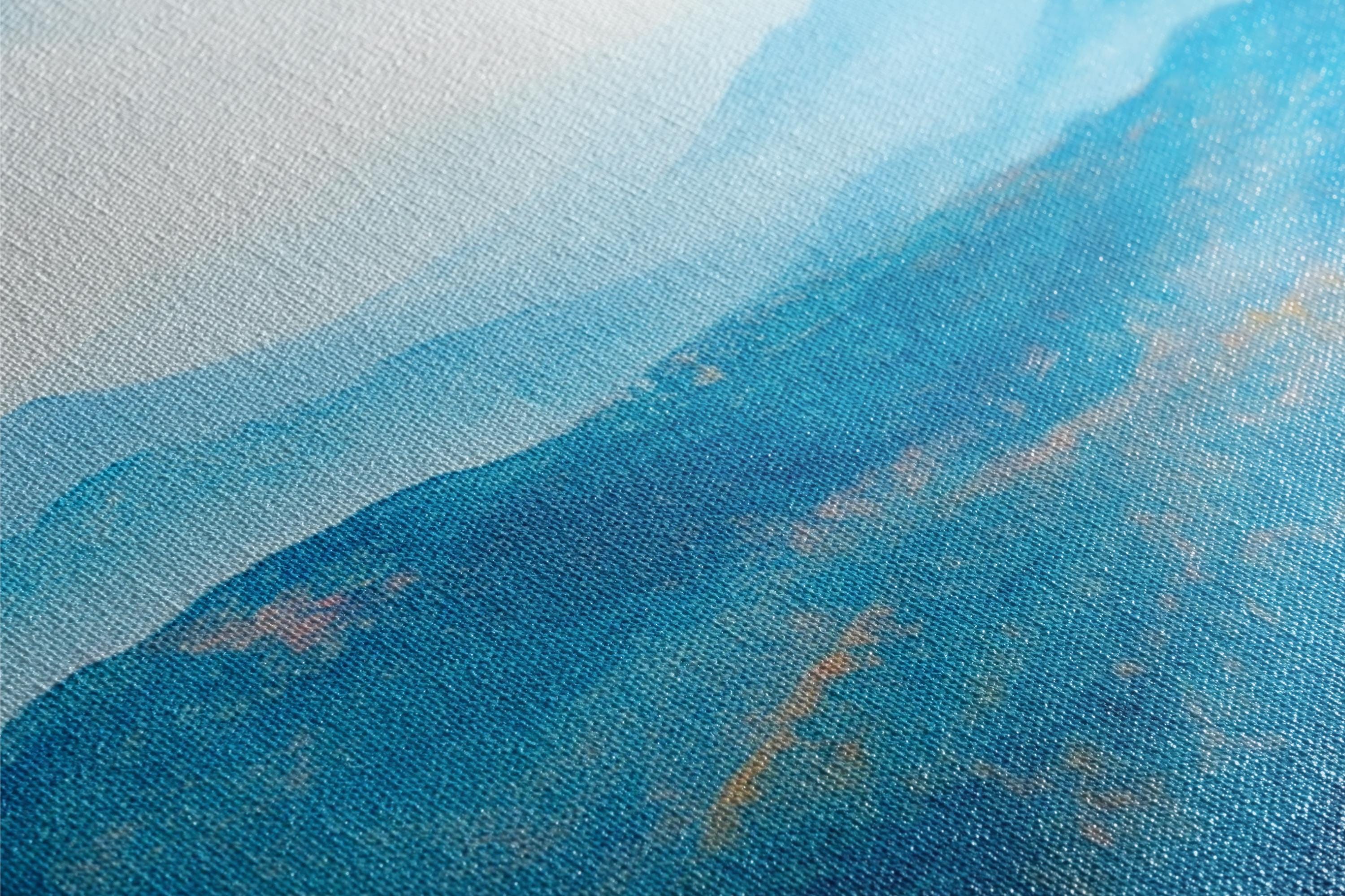 a painting of a mountain with a blue sky in the background