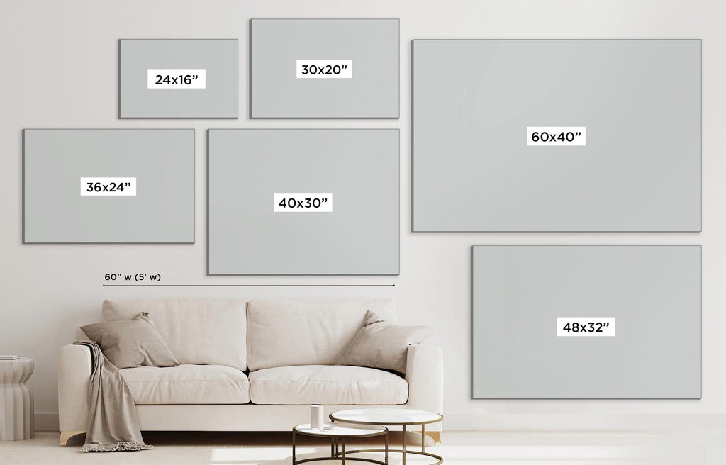 a living room with a white couch and a white wall