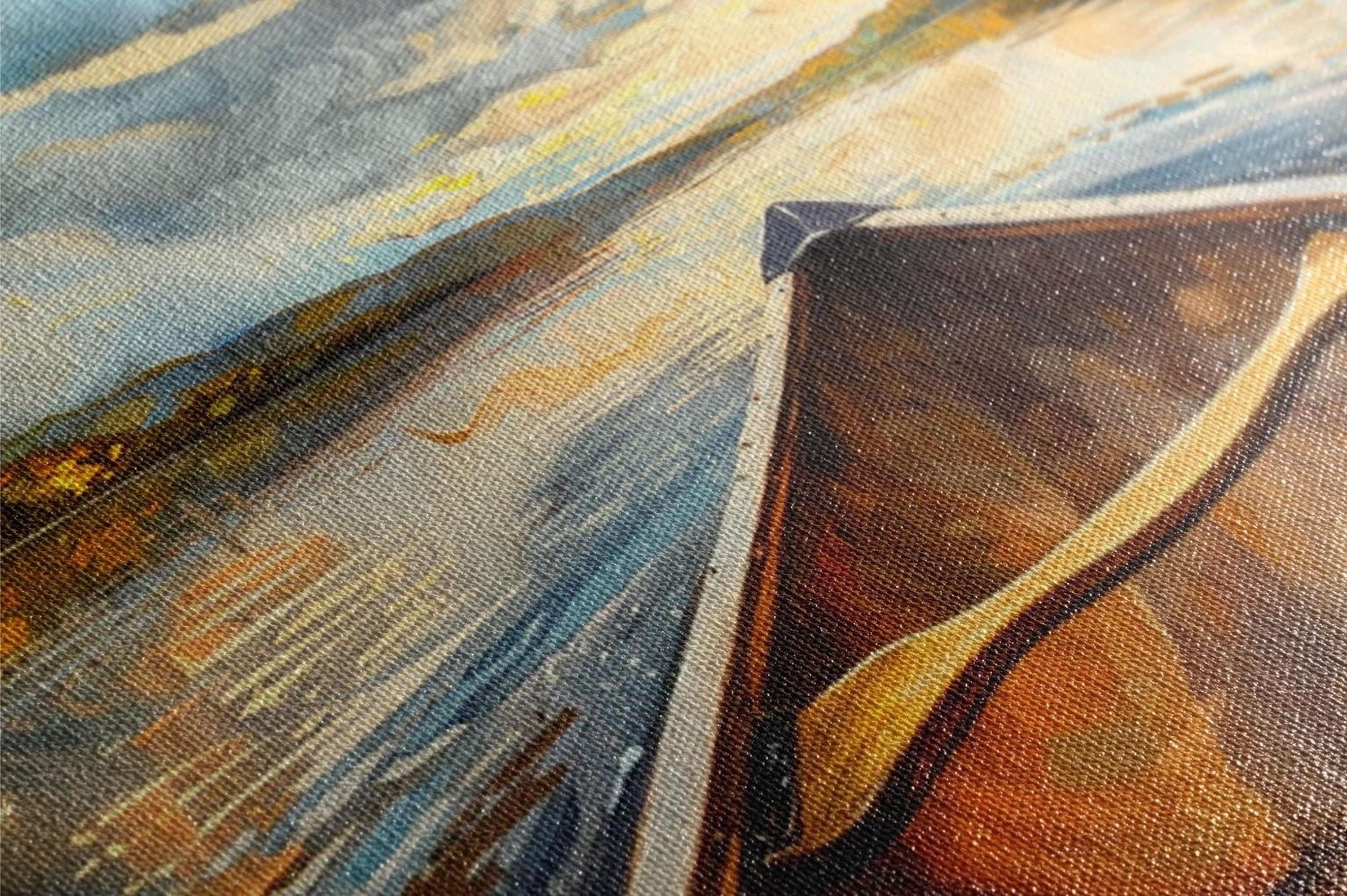 The image is a close-up of a wooden object, possibly a boat or canoe, with a textured and colorful background.
