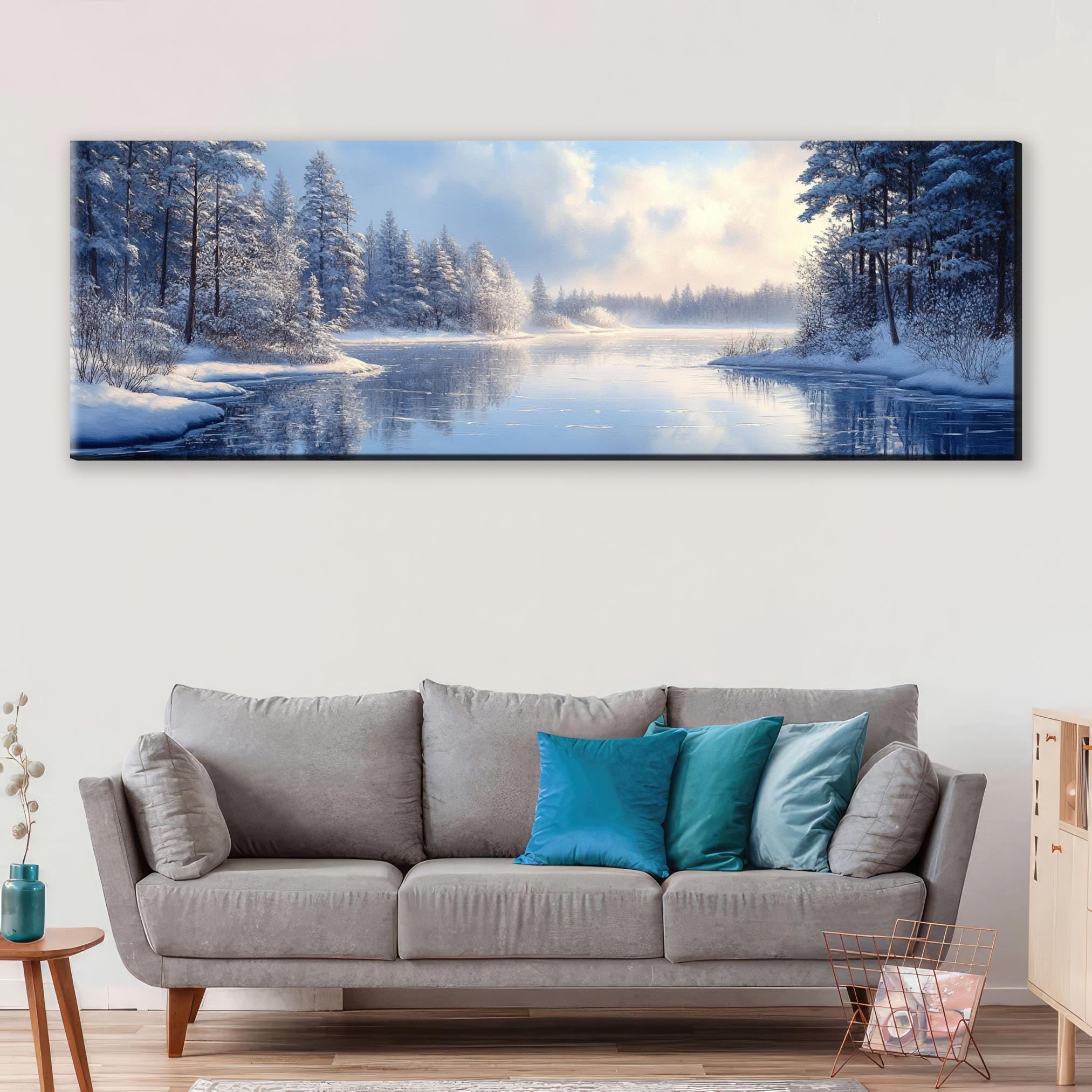 a living room with a couch and a painting on the wall