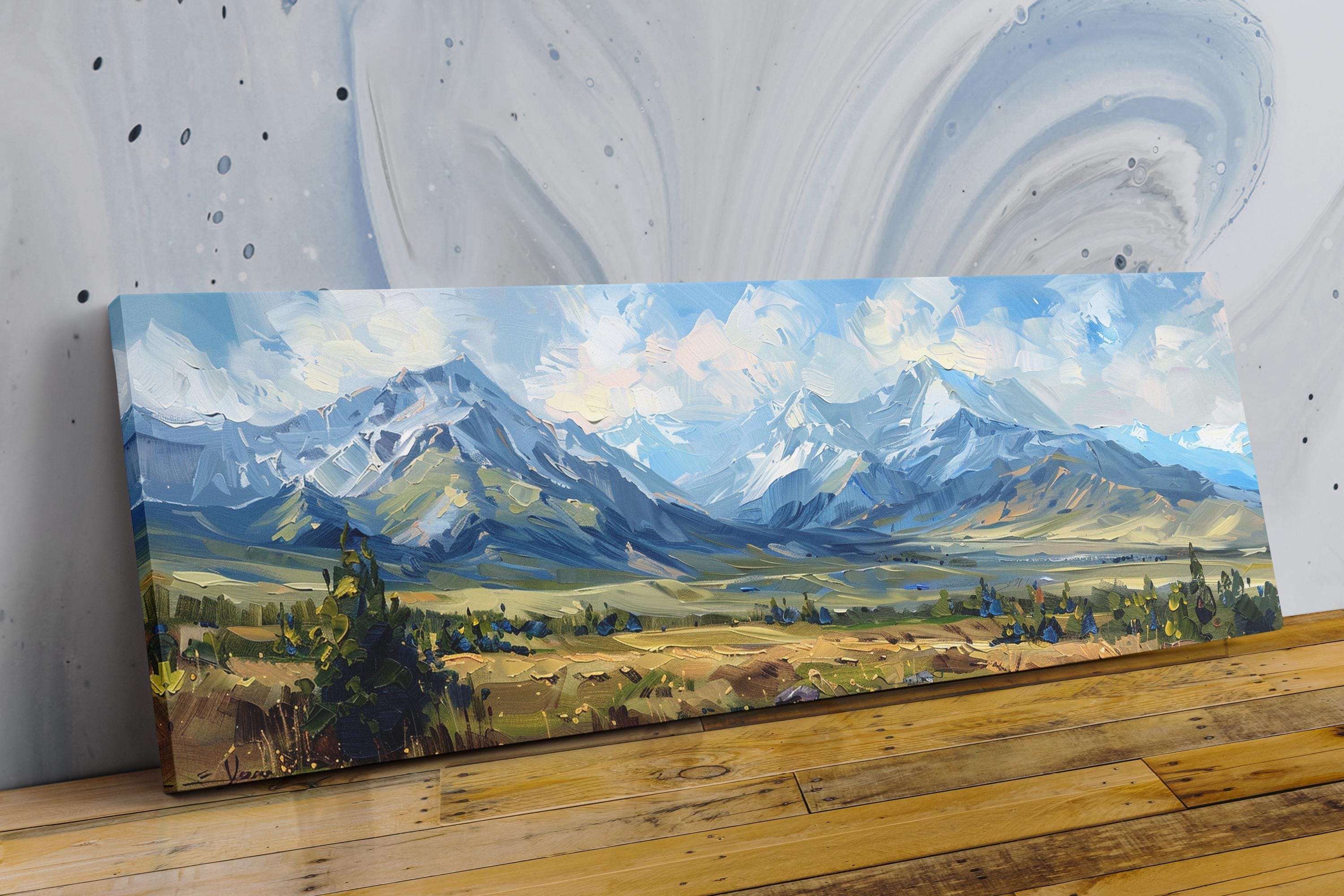 The image is a large landscape painting depicting a mountainous, forested area with a cloudy sky in the background.