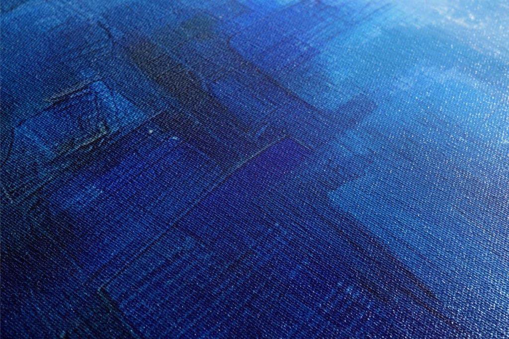 an abstract painting of blue and black colors
