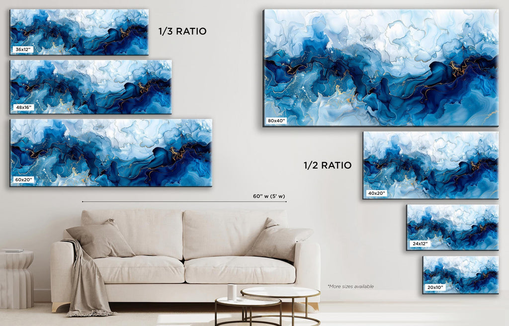 a living room with a couch and paintings on the wall