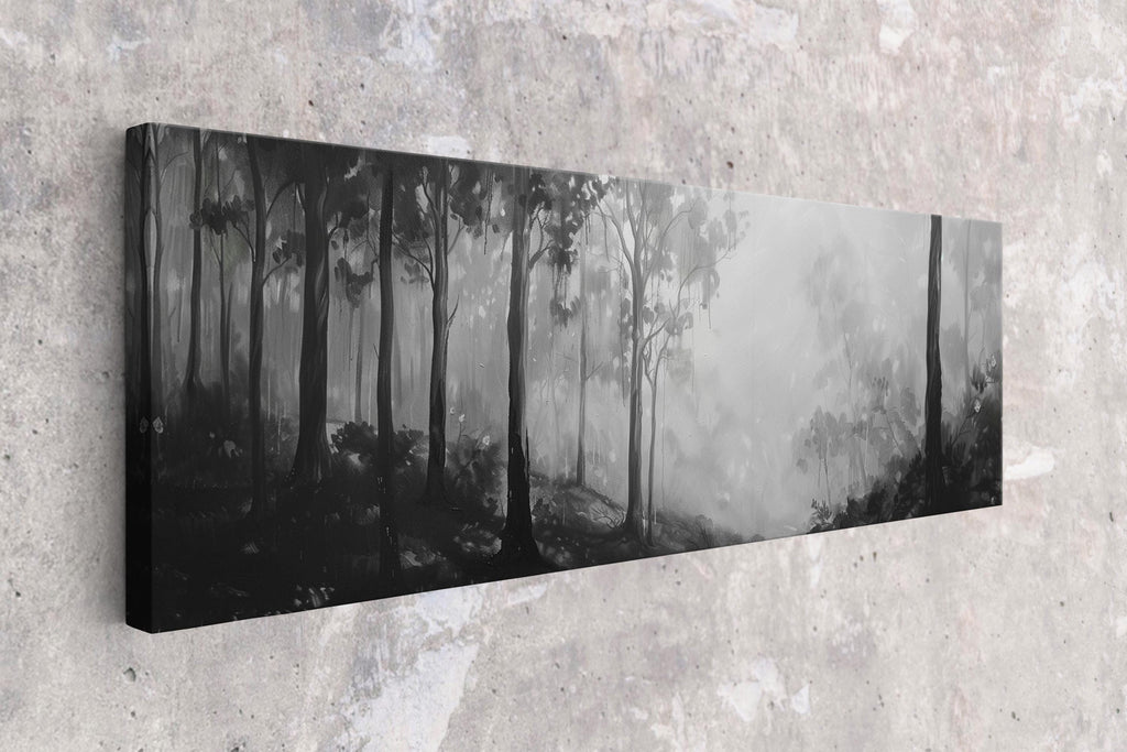a black and white photo of a forest