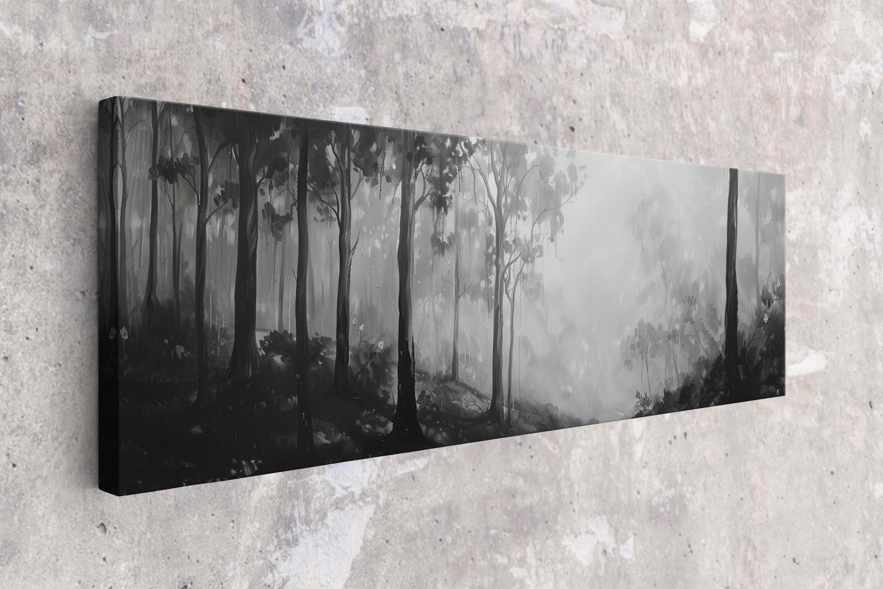a black and white photo of a forest