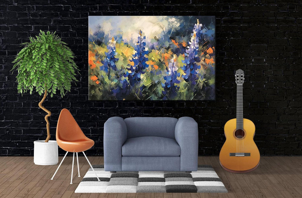 a modern living room with a large painting of colorful flowers hanging on the wall. In the room, there is a gray armchair, an orange chair, and a guitar. The room also features a potted plant and a rug on the floor.