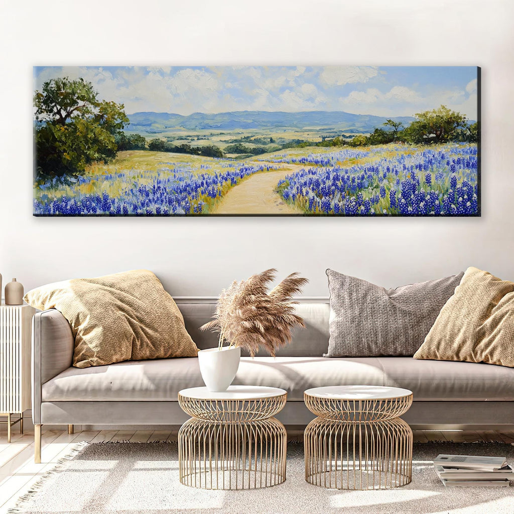 a living room with a couch and a painting on the wall