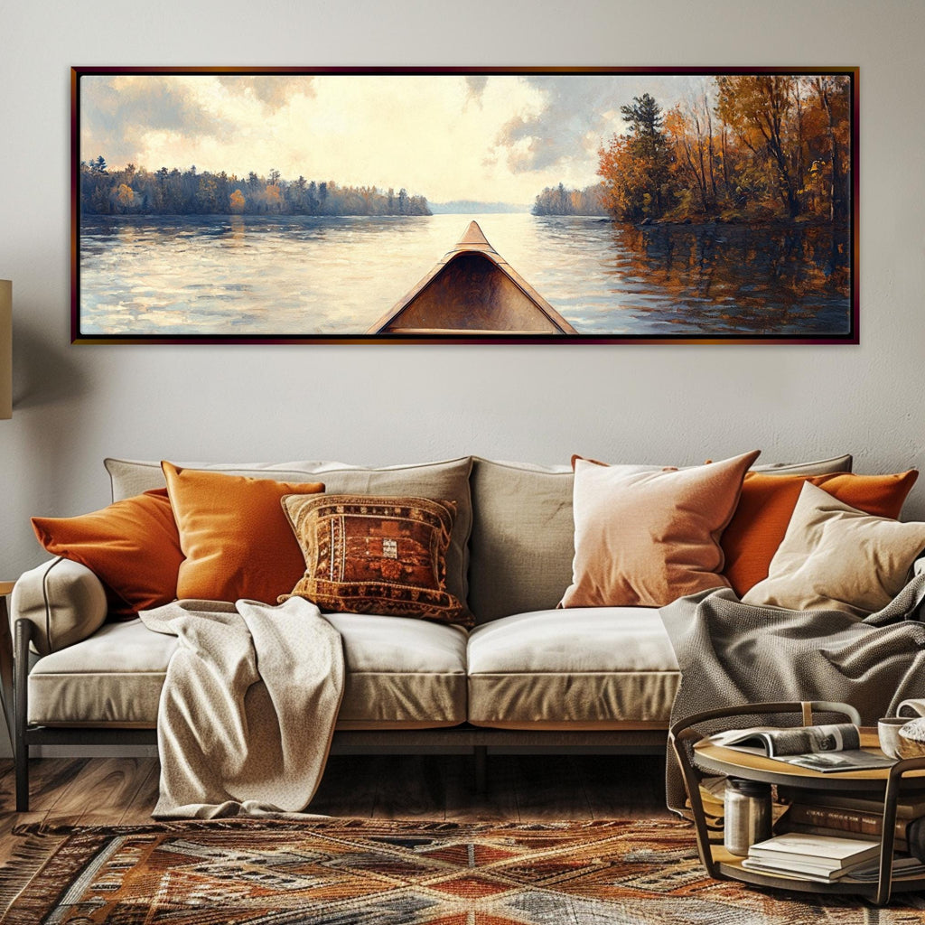 a living room with a couch and a painting on the wall