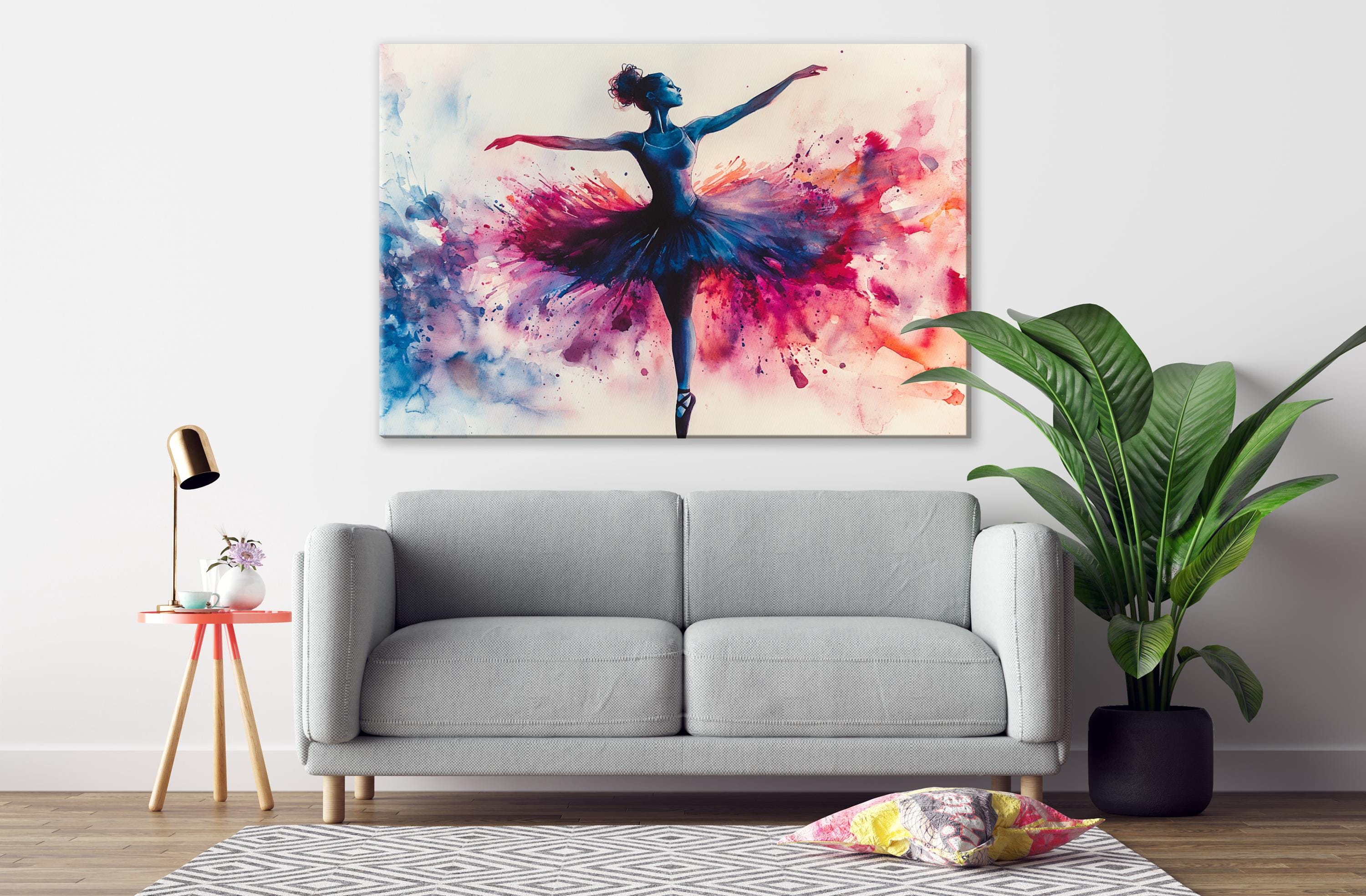 a gray sofa, a potted plant, and a painting of a ballerina on the wall.
