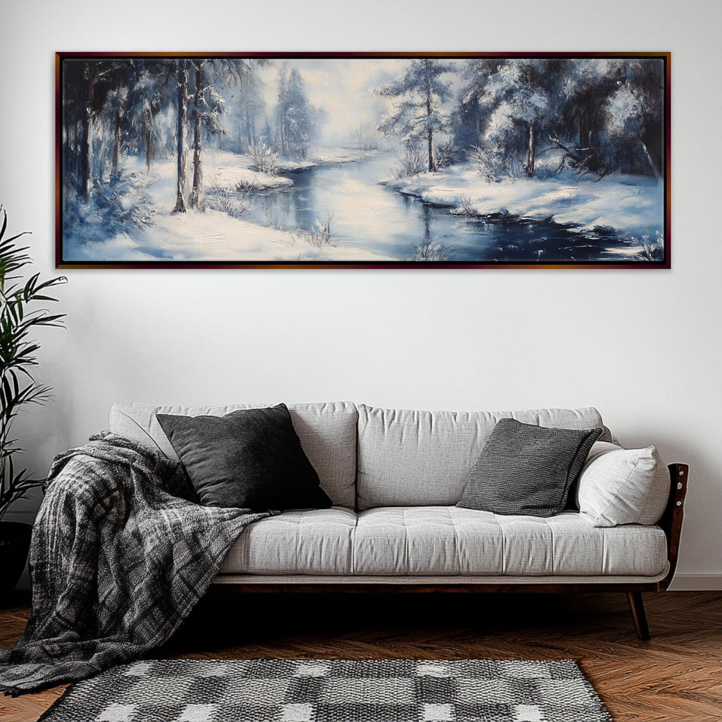 a living room with a couch and a painting on the wall